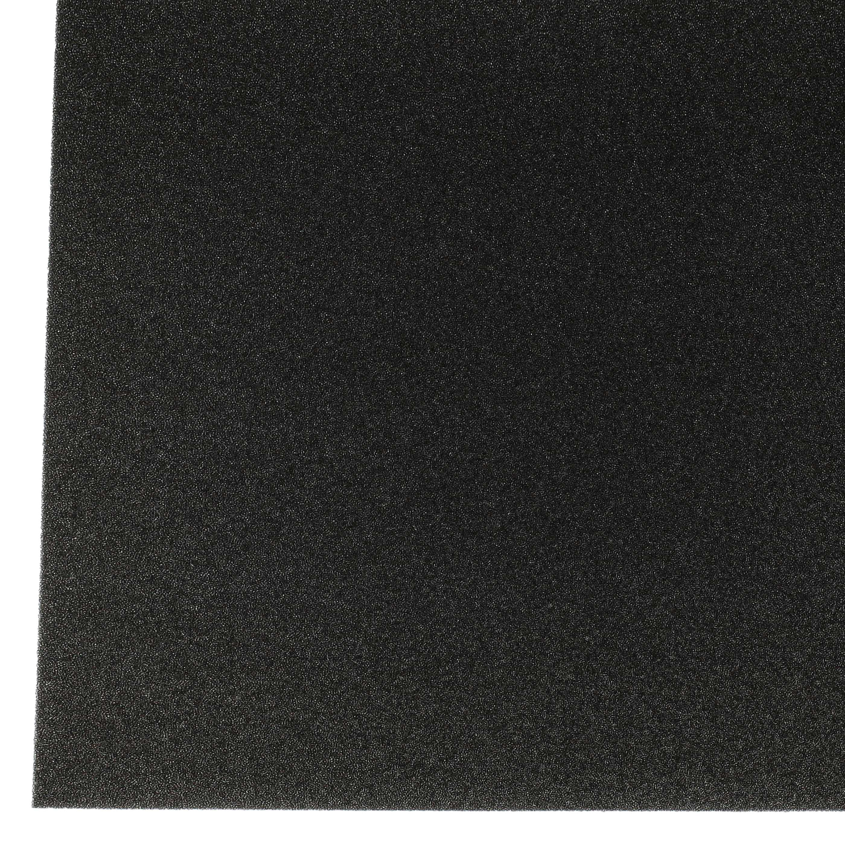 Eine Nahaufnahme einer schwarzen, strukturierten Oberfläche, möglicherweise ein Schaum- oder Gummimaterial.