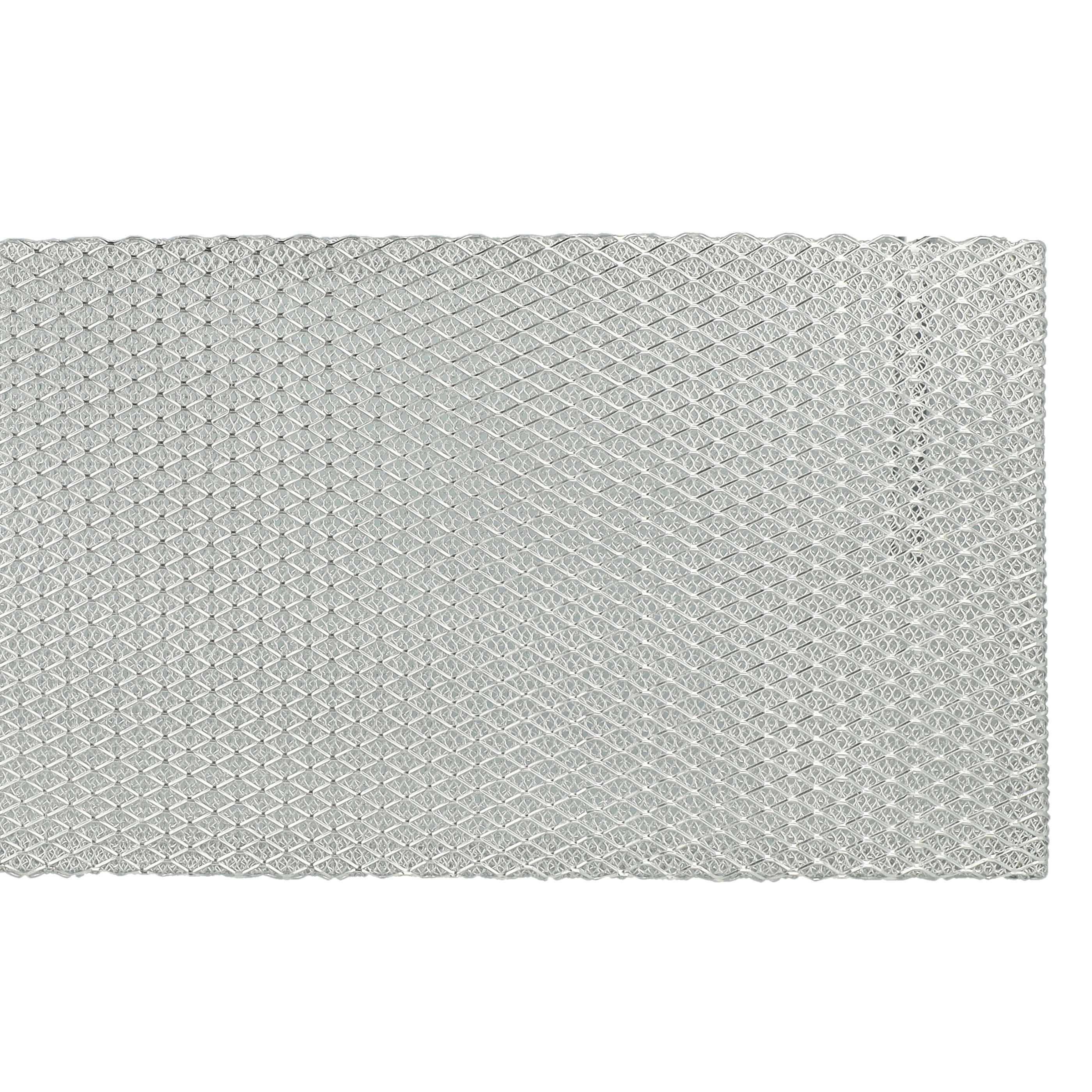Ein silberner Metallfilter mit einem Rautenmuster.