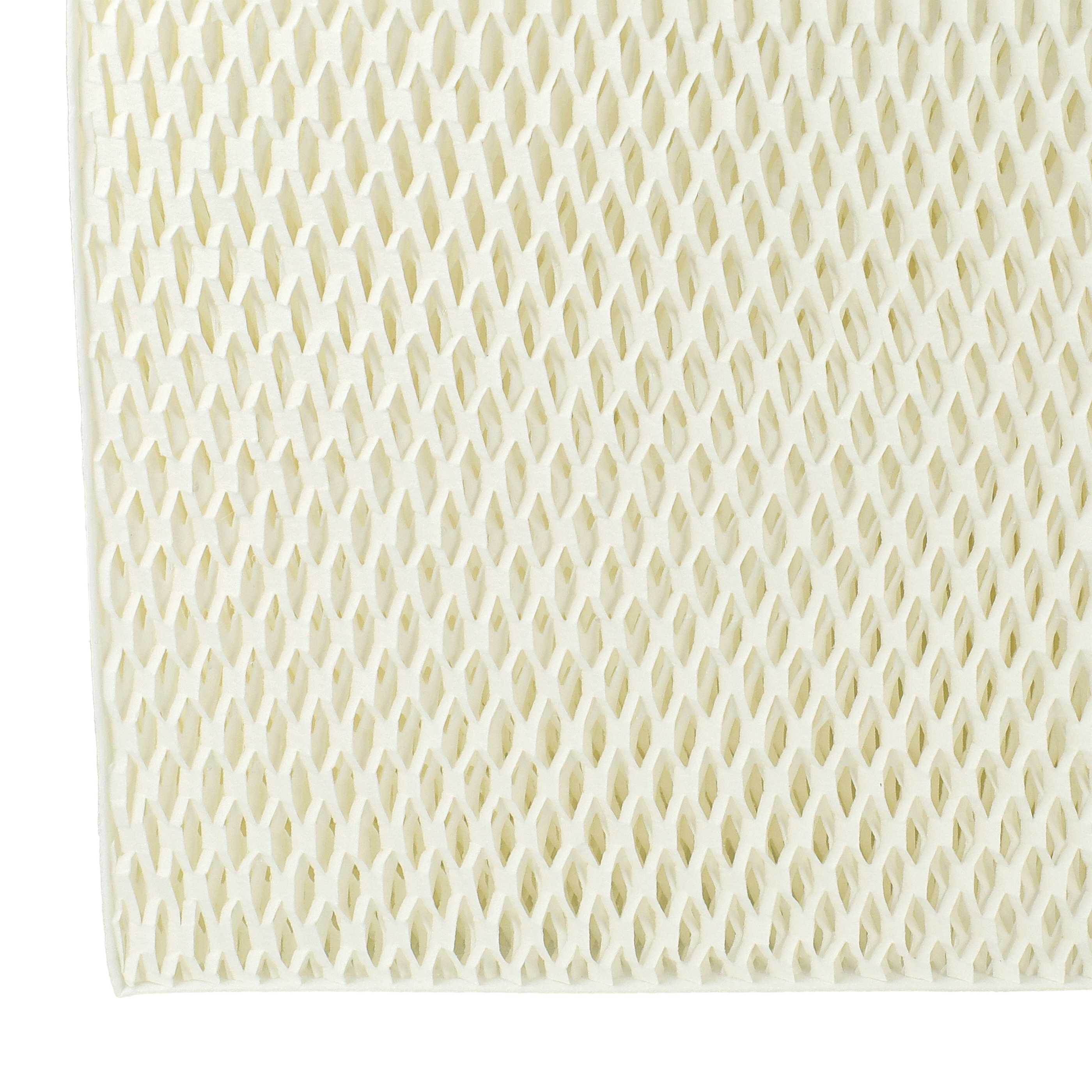 Weißes, wabenförmiges Filtermaterial, Detailaufnahme.