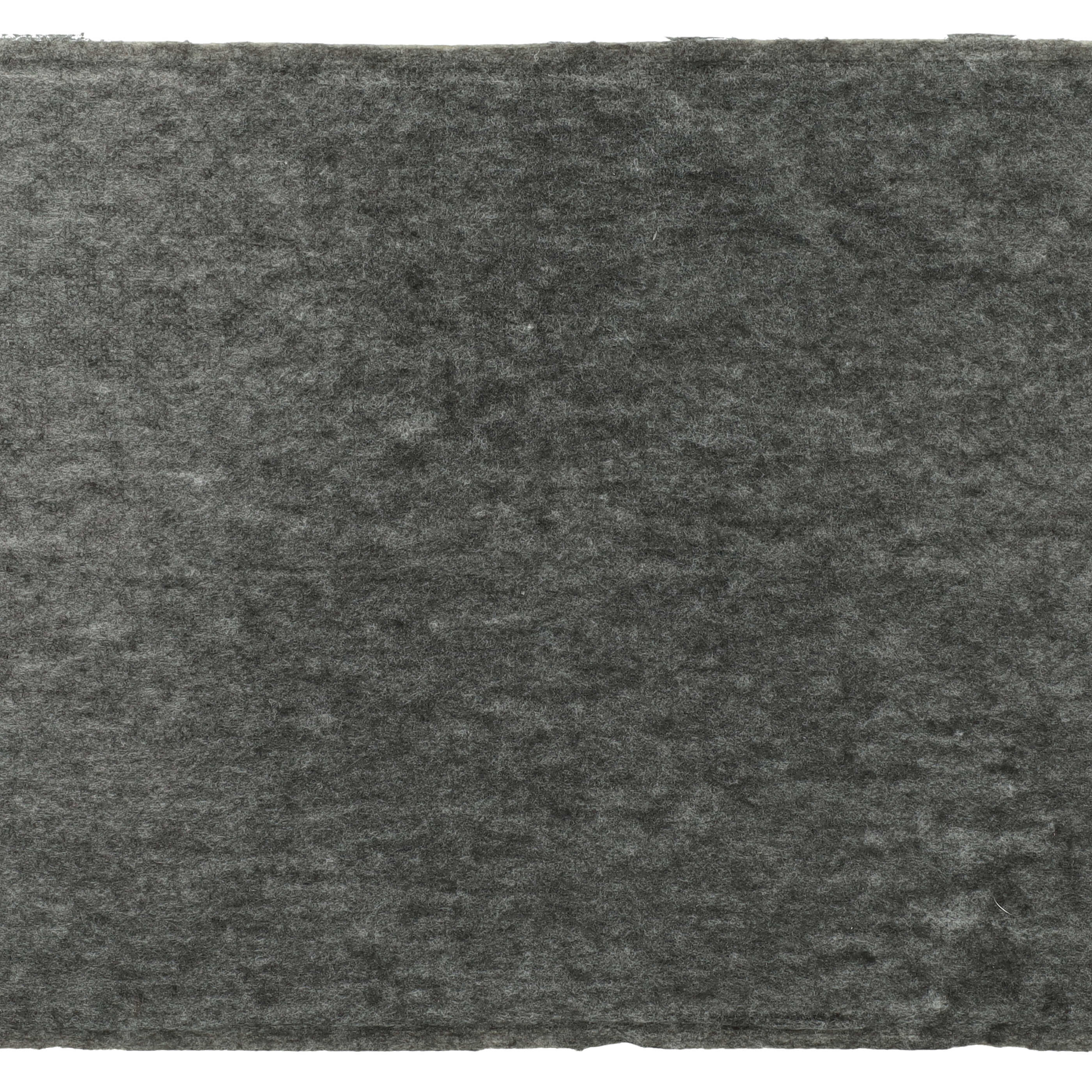 Ein dunkelgrauer rechteckiger Filter. Die Textur hat ein raues, poröses Aussehen.