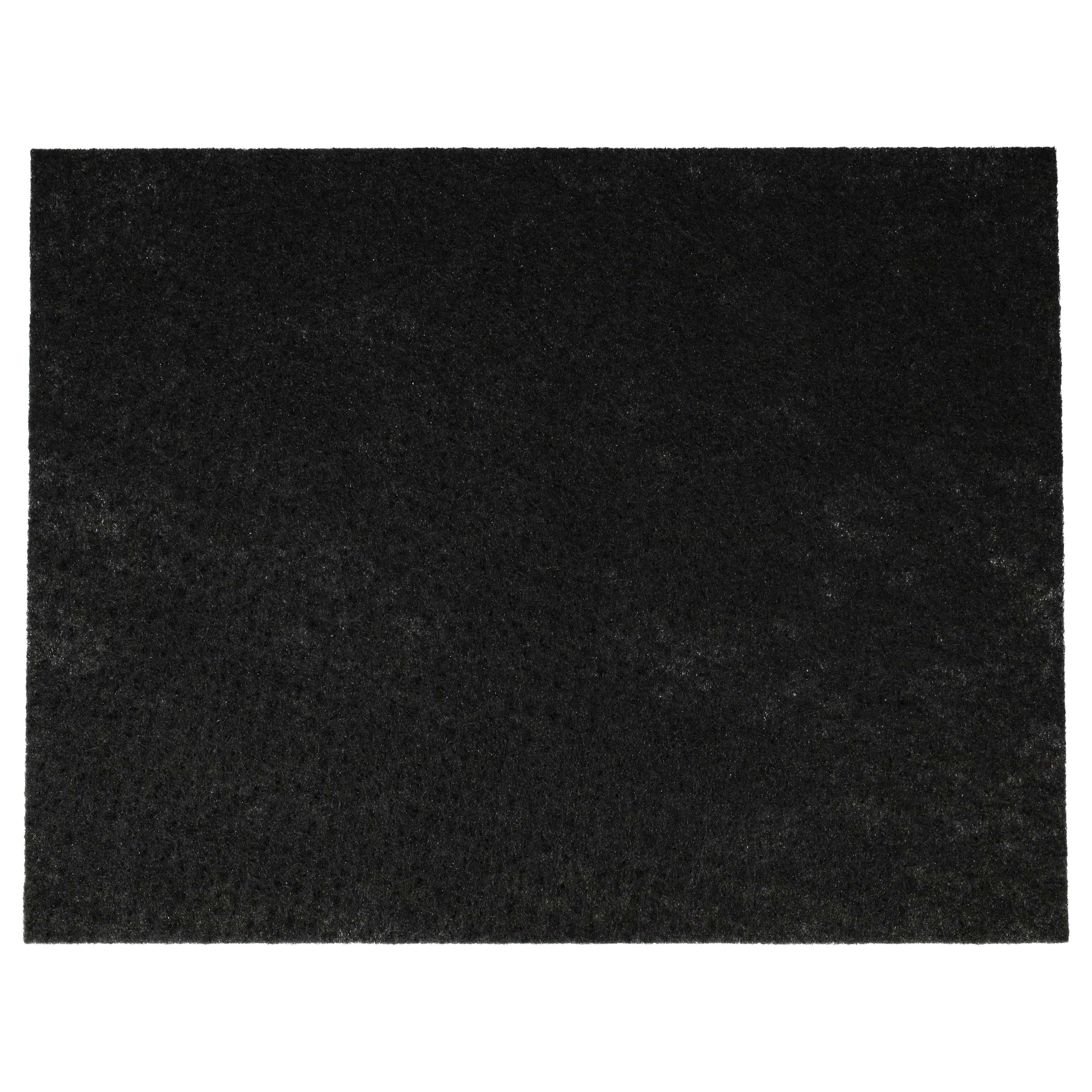 Ein schwarzer rechteckiger Filter, von oben gesehen, mit rauer, dunkler Textur.