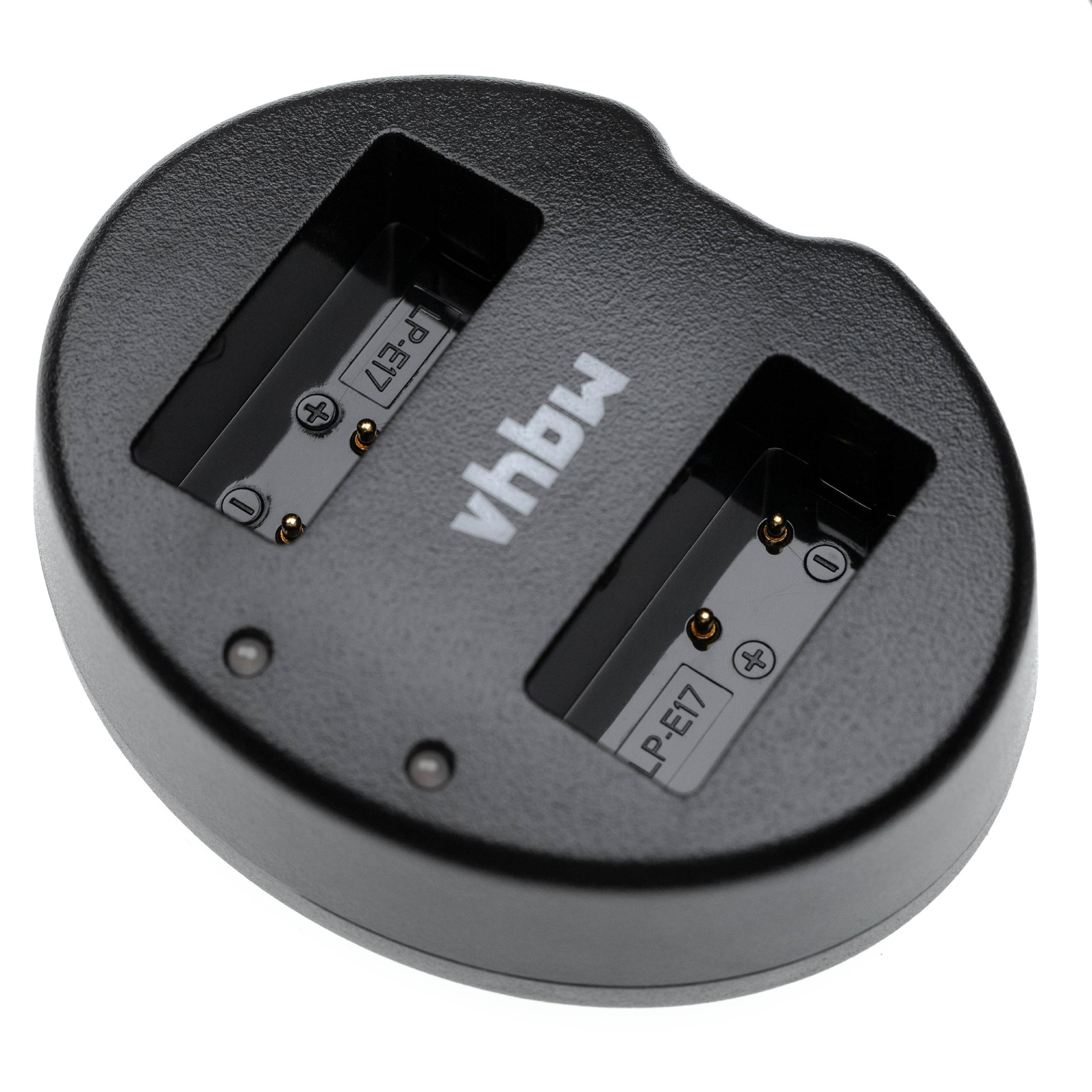 Schwarzes Dual-Batterieladegerät mit zwei Ladeschlitzen. Der Markenname lautet 'mhqu' oben.