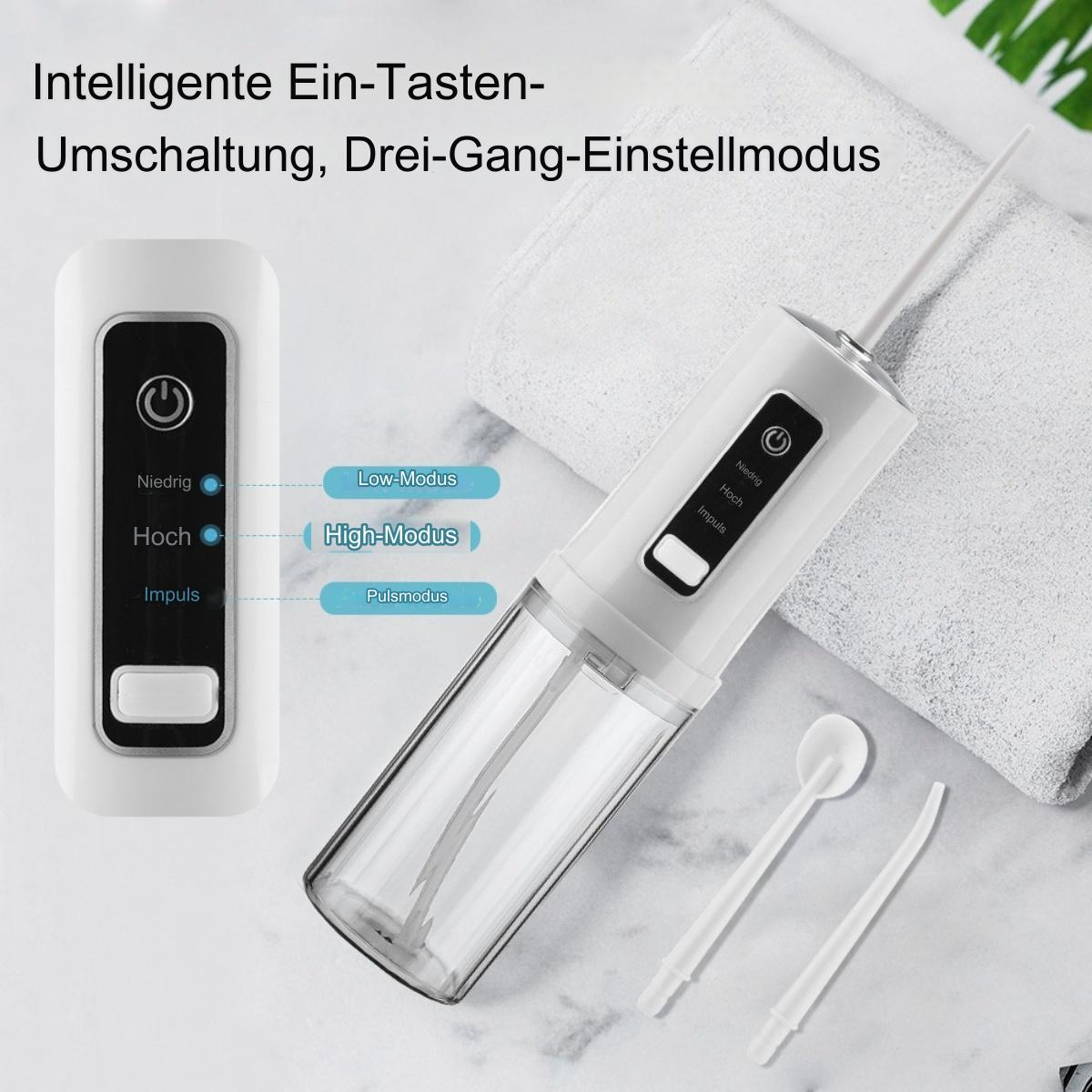 Ein Dental-Irrigator mit Bedienfeld und zwei weißen Reinigungsaufsätzen.