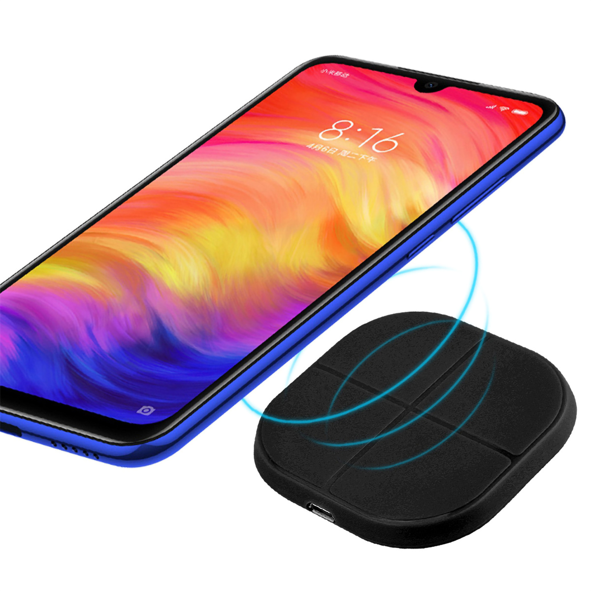 Smartphone auf kabellosem Ladegerät. Telefon hat blauen Rahmen und farbigen Bildschirm.