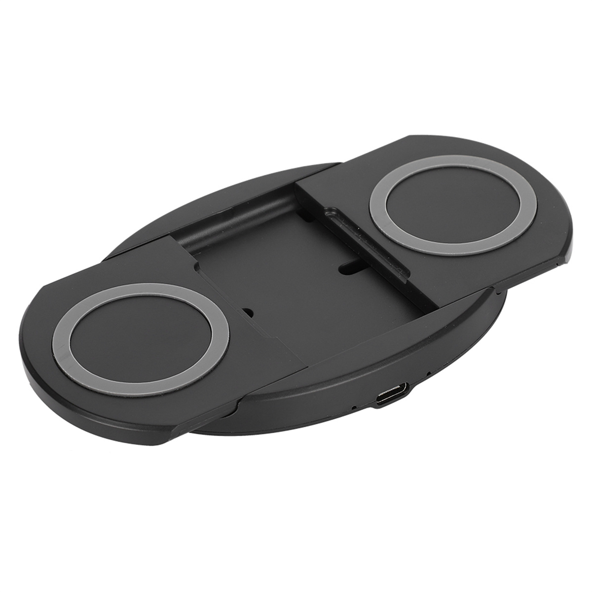 Schwarzes, zusammenklappbares Ladepad mit zwei kreisförmigen Ladebereichen. Ein USB-Anschluss ist sichtbar.