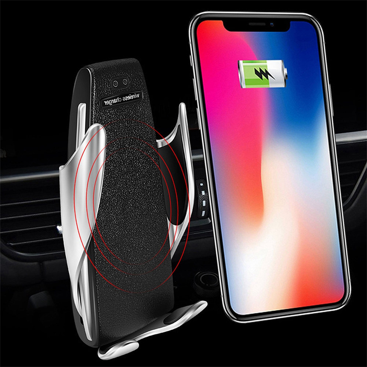 Eine schwarze und silberne Autotelefonhalterung mit ladendem Telefon. Das Telefon hat einen roten und rosa Bildschirm.