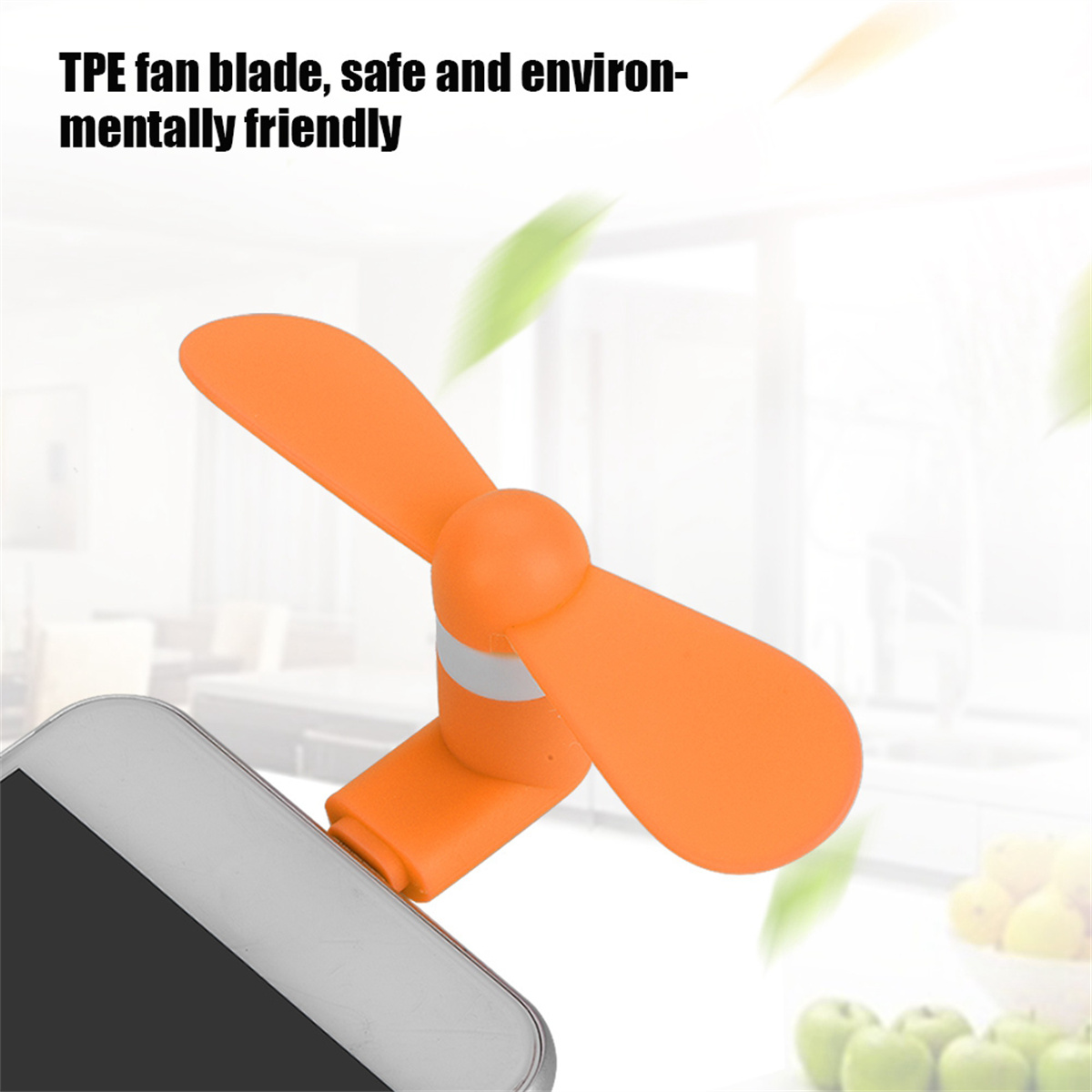 Ein orangefarbener Ventilator mit zwei Flügeln, der an einem Telefon befestigt ist. Text: TPE-Lüfterblatt, sicher und umweltfreundlich.