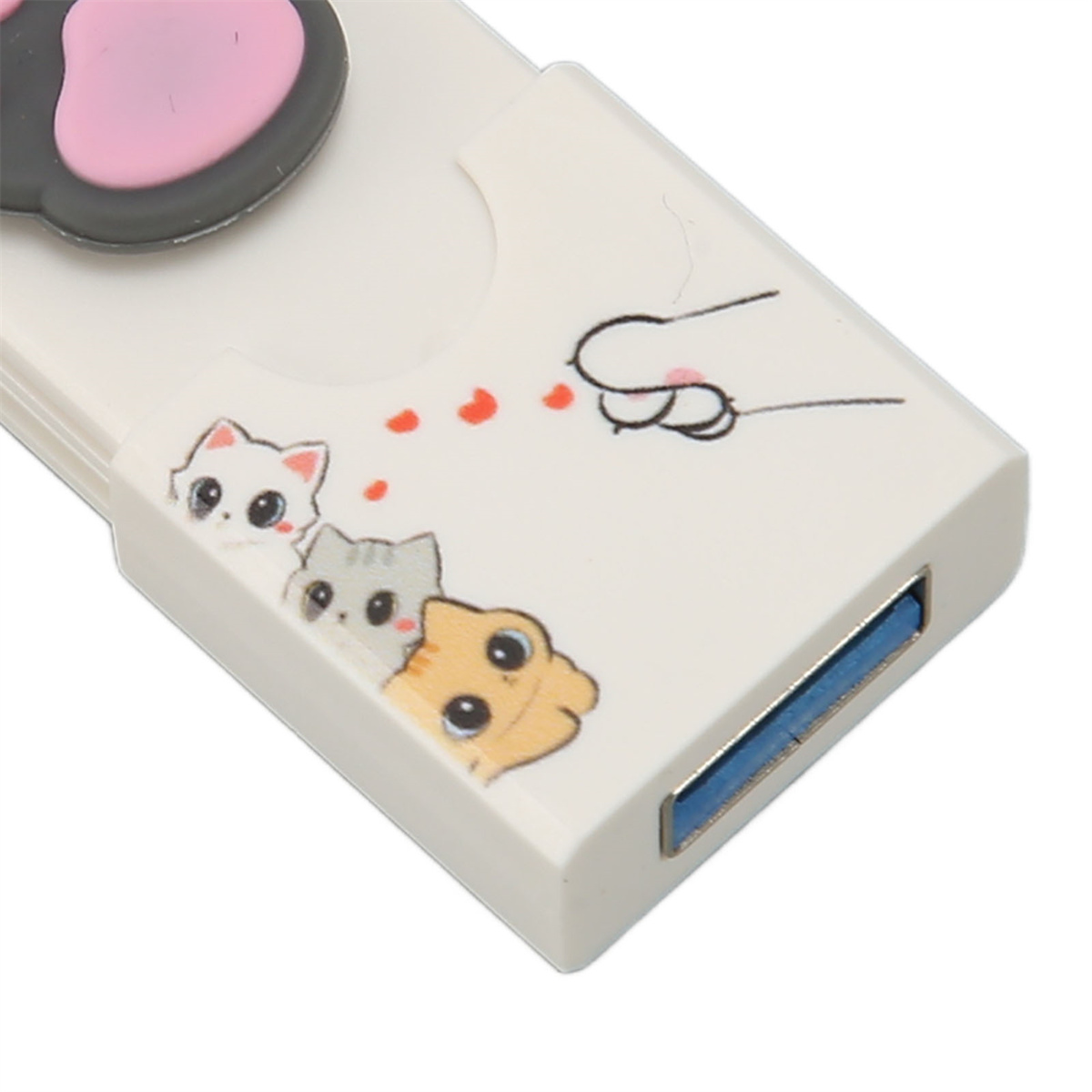 Ein weißer USB-Hub mit Katzenkopf und Pfotenabdrücken. Drei Cartoon-Katzen sind auf dem Hub zu sehen.