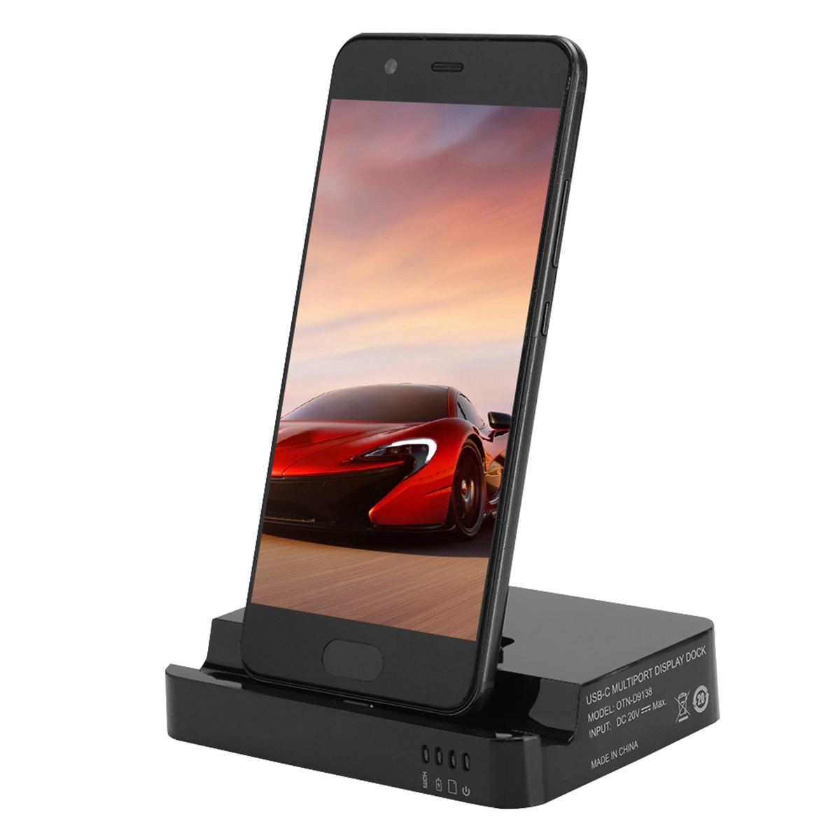 Schwarzes Telefon auf einer schwarzen Ladestation, mit rotem Auto auf dem Bildschirm.