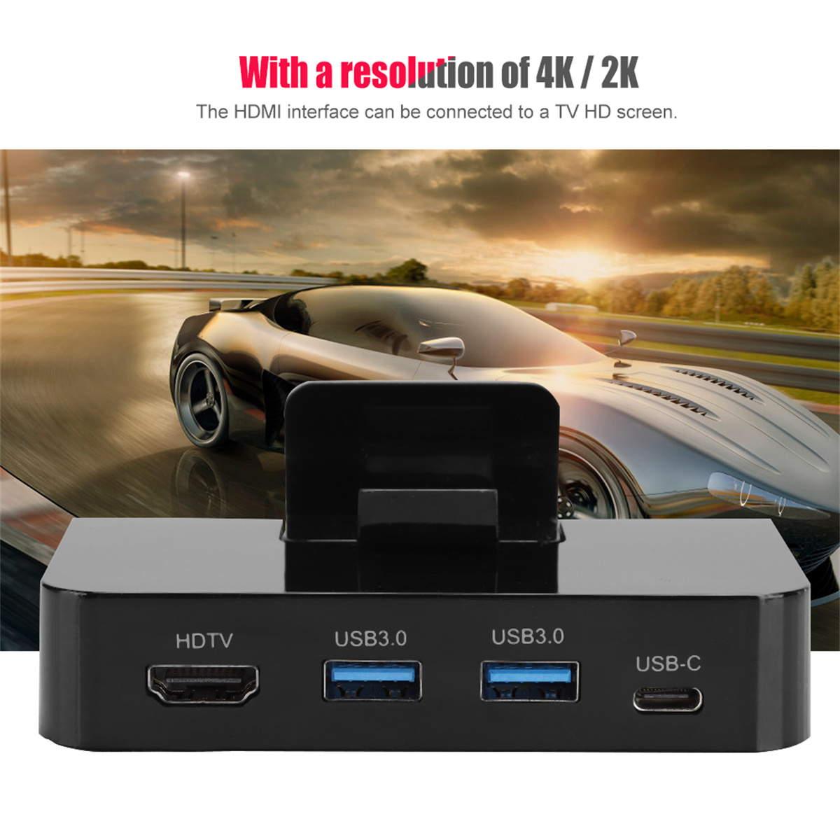 Ein schwarzes Gerät mit USB-Anschlüssen und einem HDMI-Anschluss, mit Text über 4K/2K-Auflösung und einem Auto.