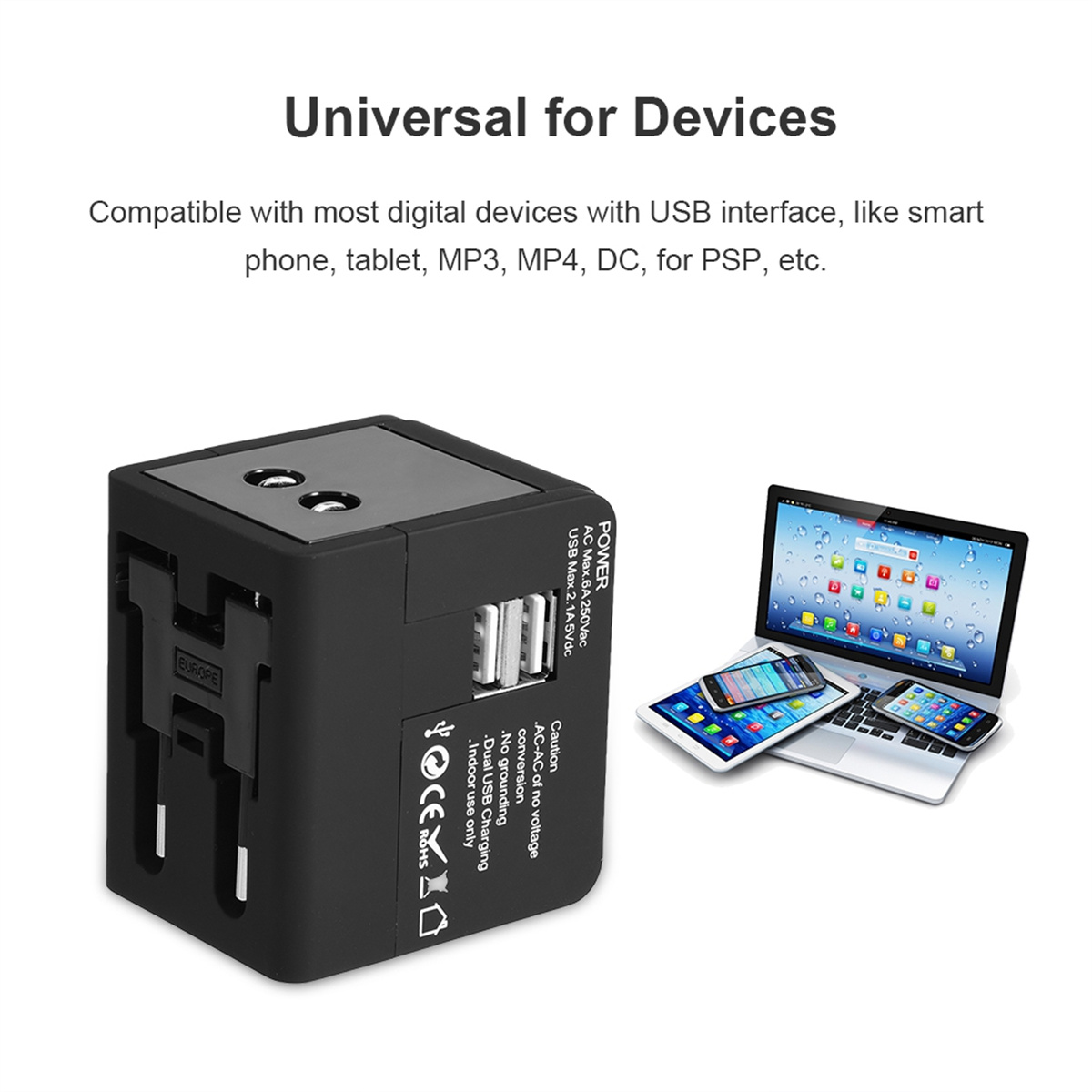 Ein schwarzer Universal-Reiseadapter mit USB-Anschlüssen und Geräten wie Laptop und Telefonen.