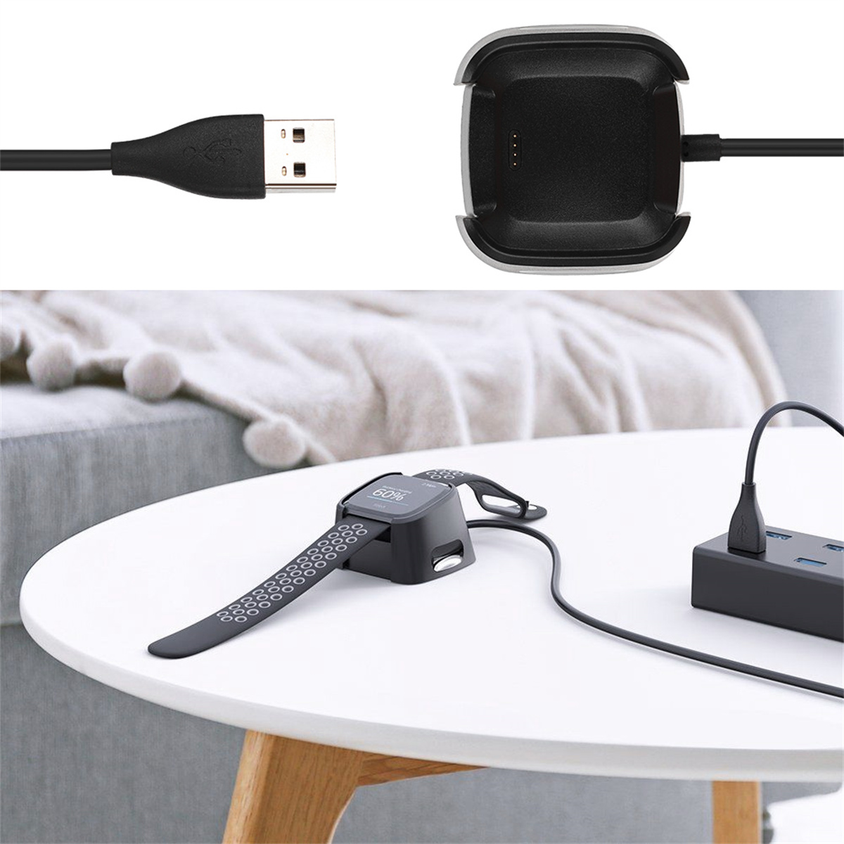 Ladegerät-Setup mit einer Uhr auf einer Ladestation und einer weiteren auf weißer Oberfläche.