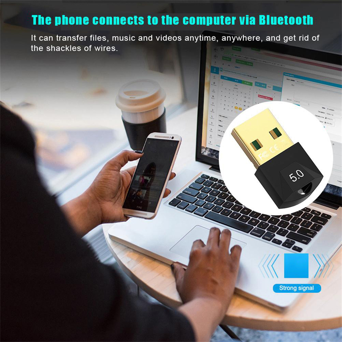 Person nutzt Laptop und Telefon, Bluetooth-Adapter und Text.