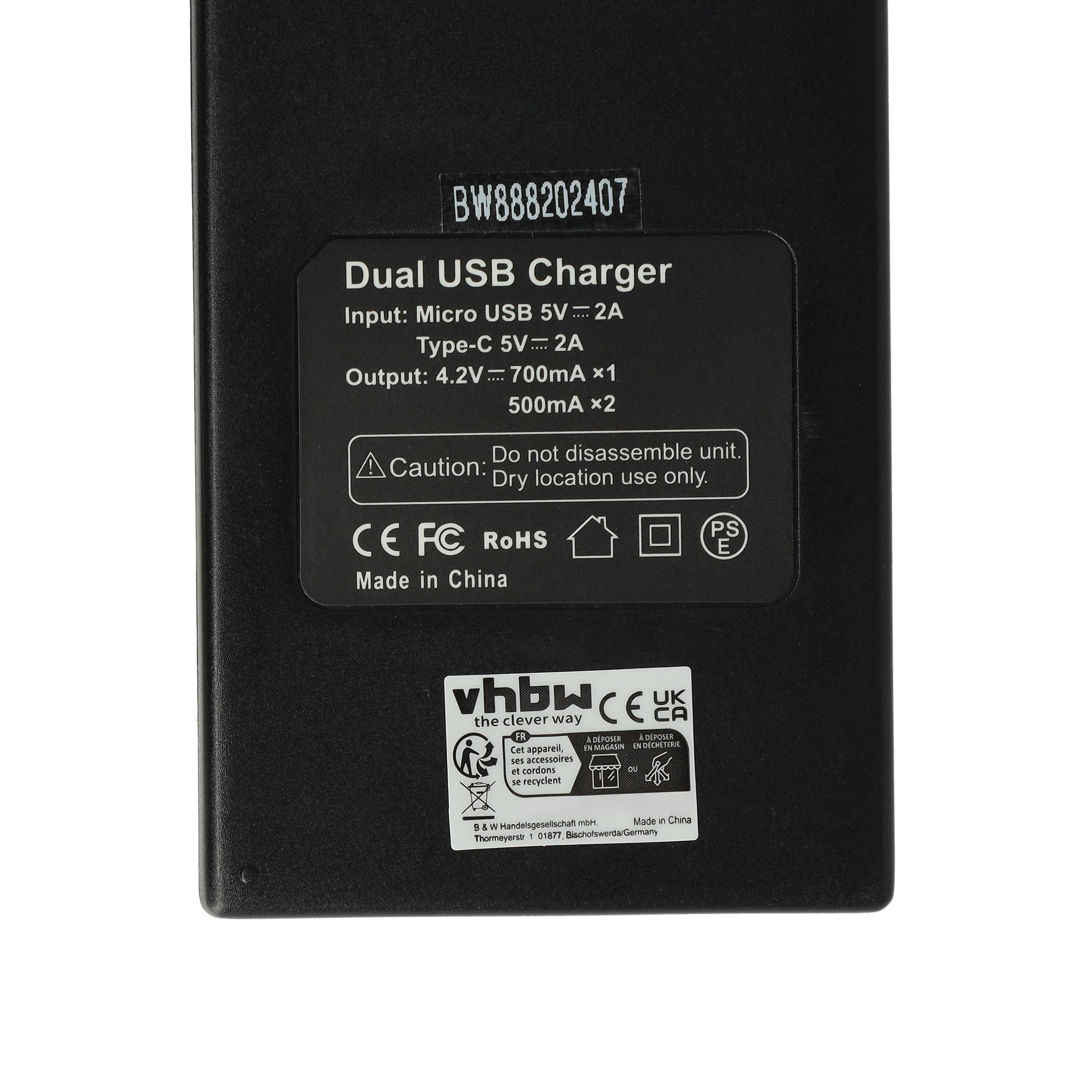 Dual-USB-Ladegerät mit Spezifikationsetikett. Text enthält Eingabe, Ausgabe und eine Vorsicht.