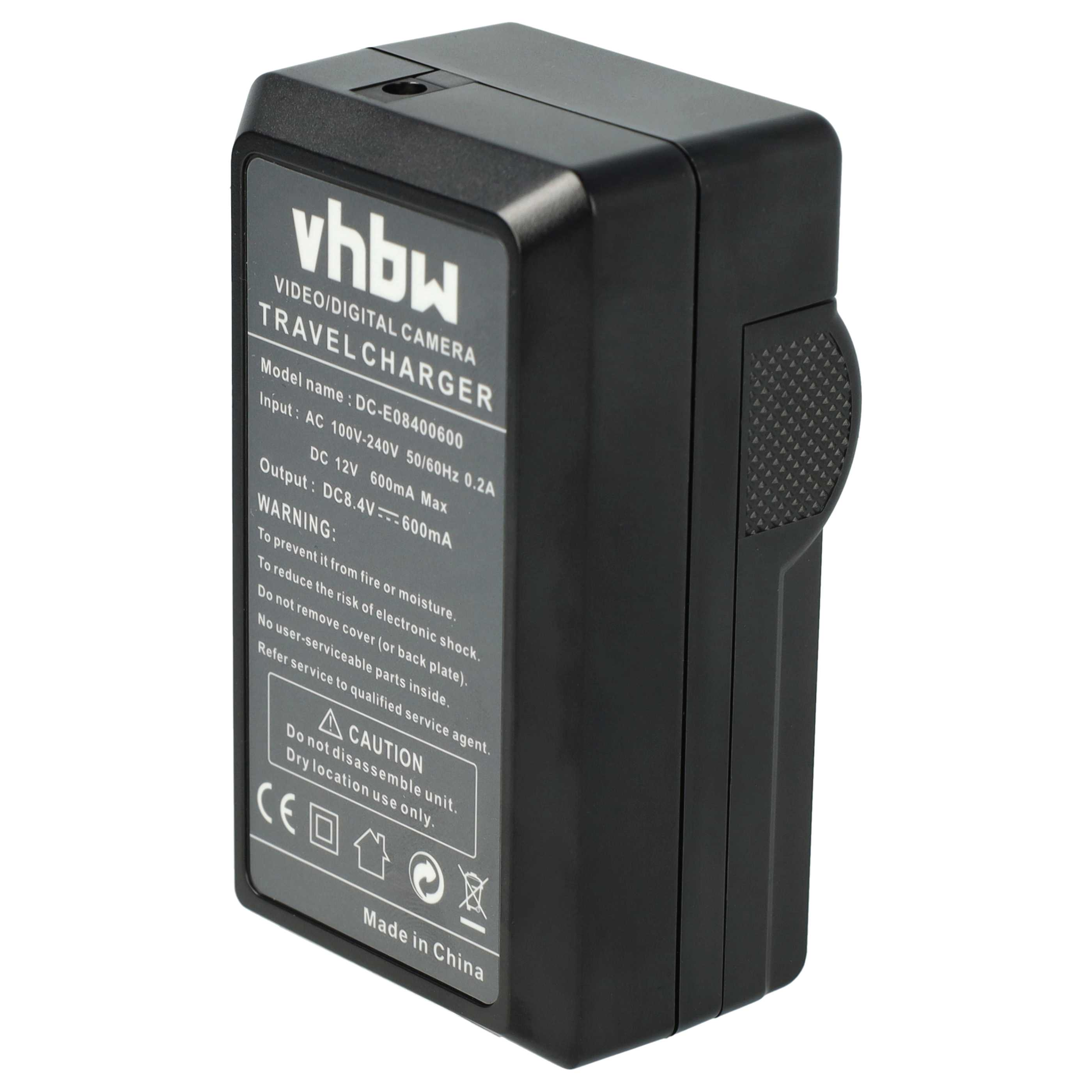 Schwarzes Reise-Ladegerät mit Text: "VIDEO/DIGITAL CAMERA TRAVEL CHARGER", hergestellt in China.