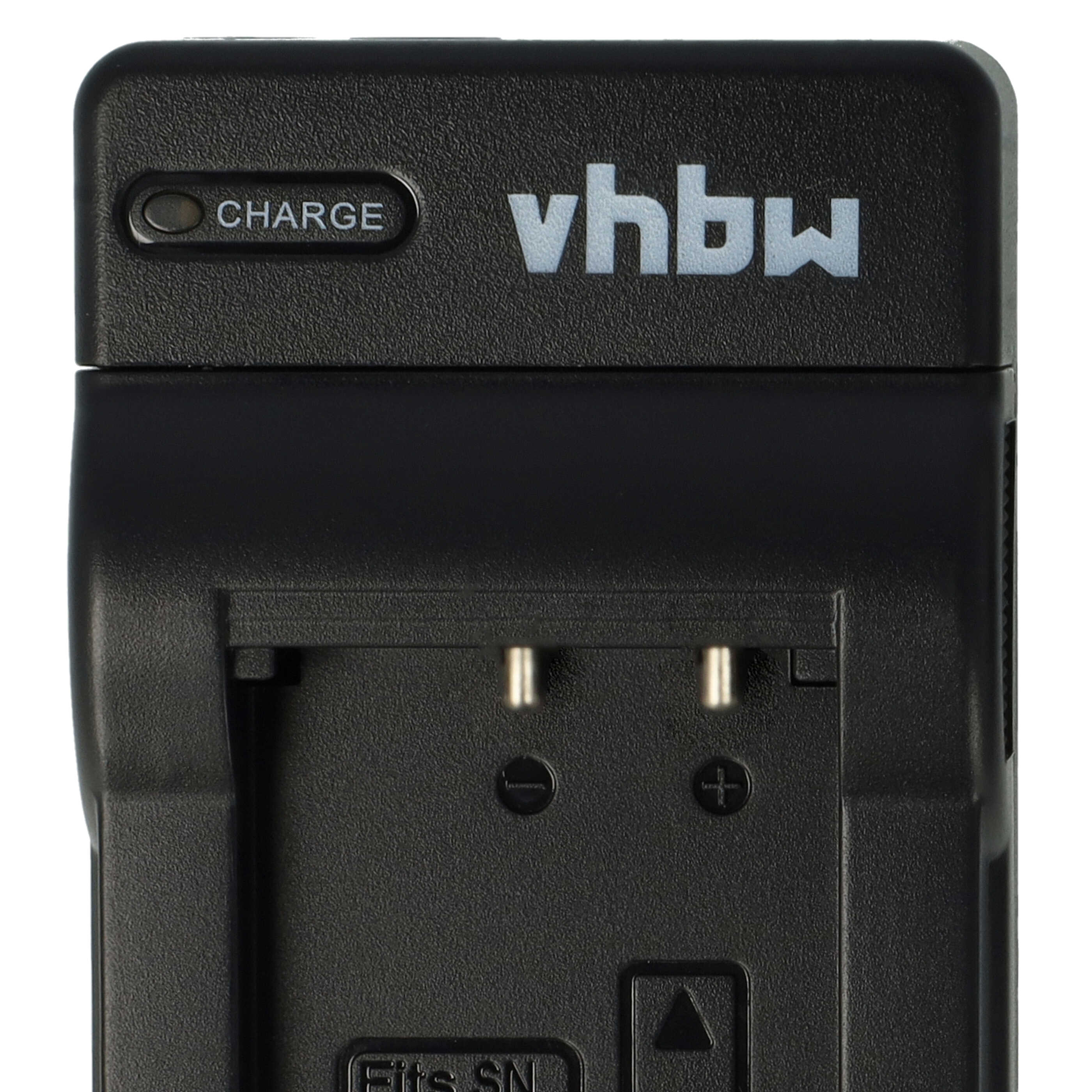 Schwarzes Batterieladegerät mit den Aufschriften 'CHARGE' und 'vhbw'. Hat zwei Metallkontakte.