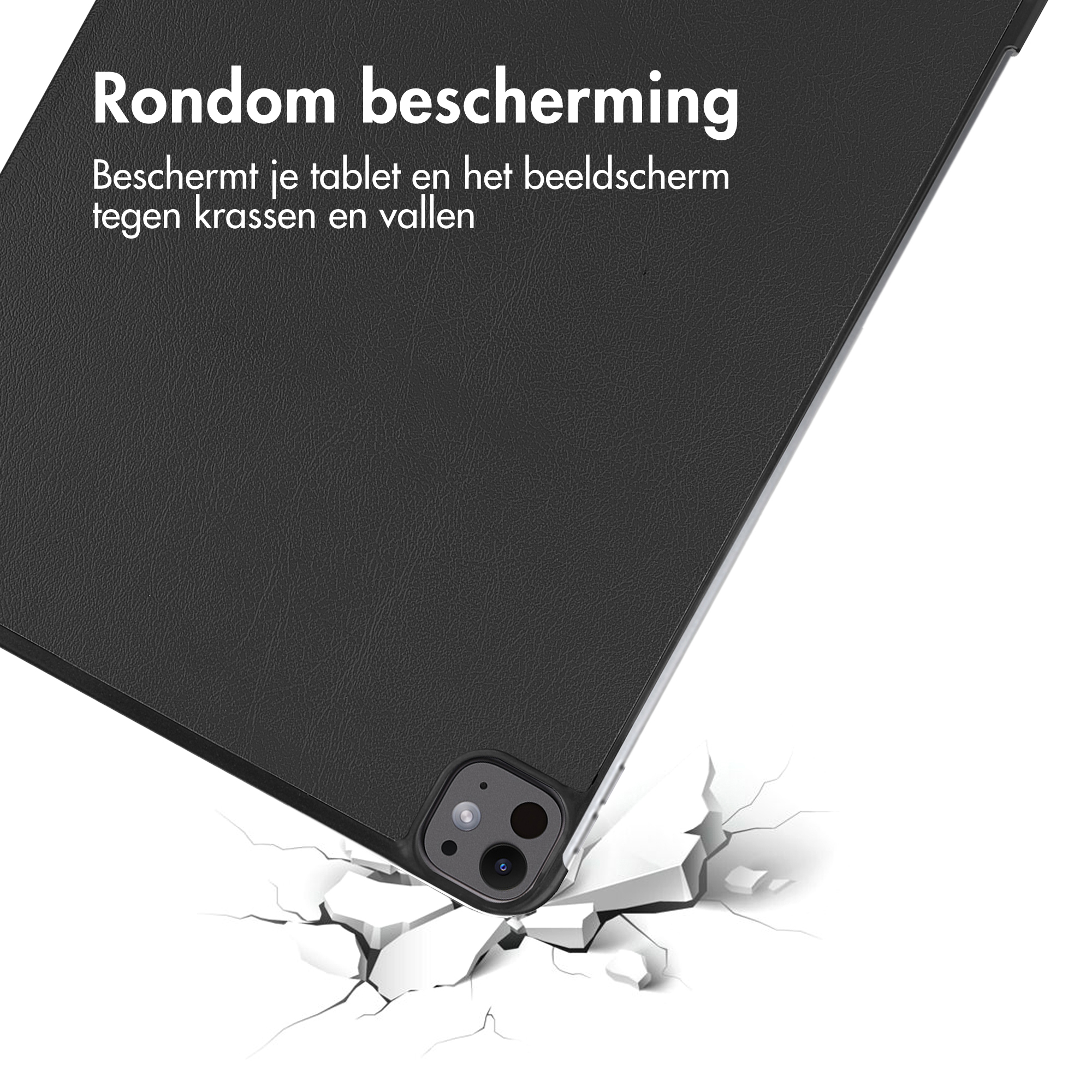 A black tablet case with a tablet inside. The tablet is resting on the ground, the ground is cracked.