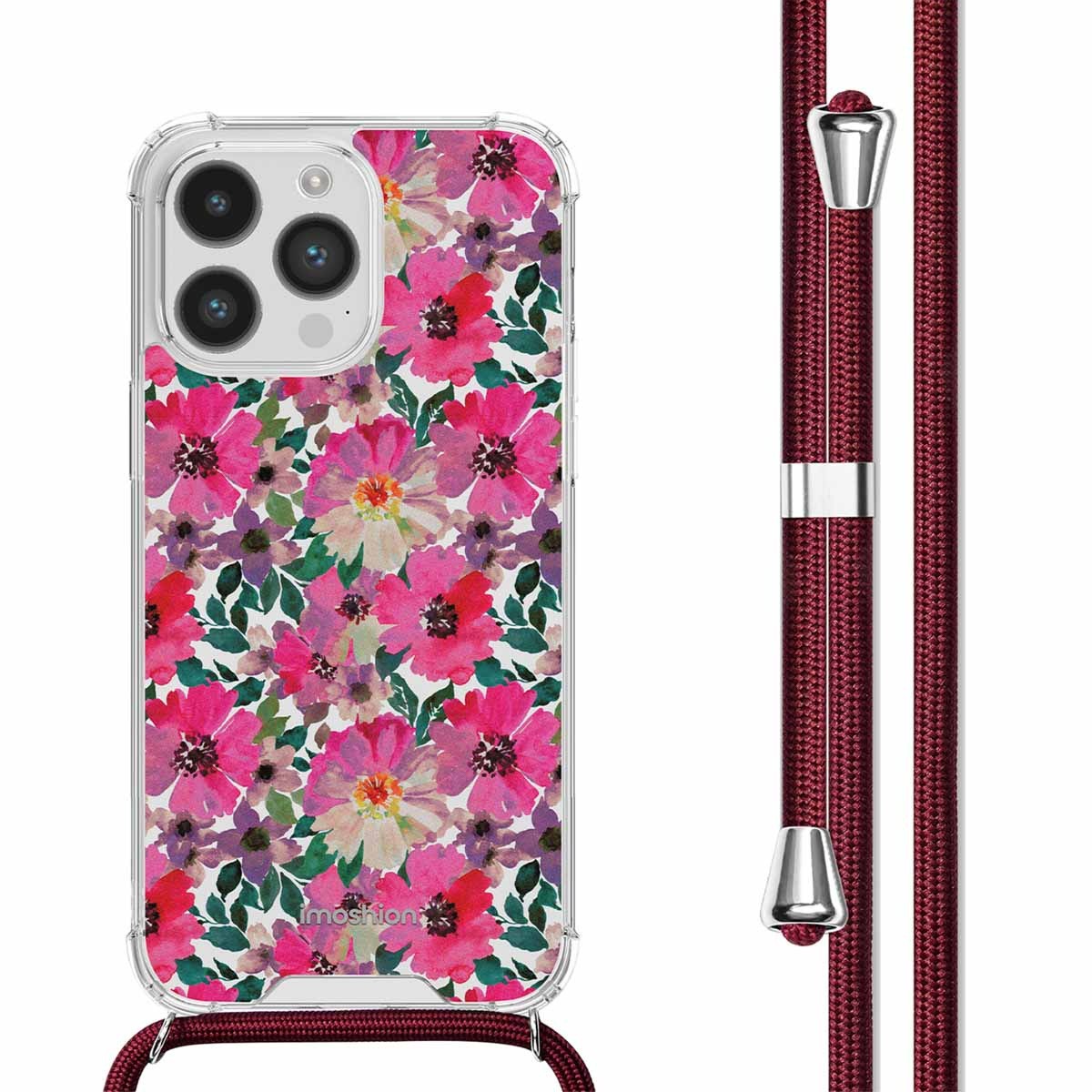 Une coque de téléphone avec un motif floral et une lanière. Fleurs roses et blanches, feuilles vertes. Lanière rouge.