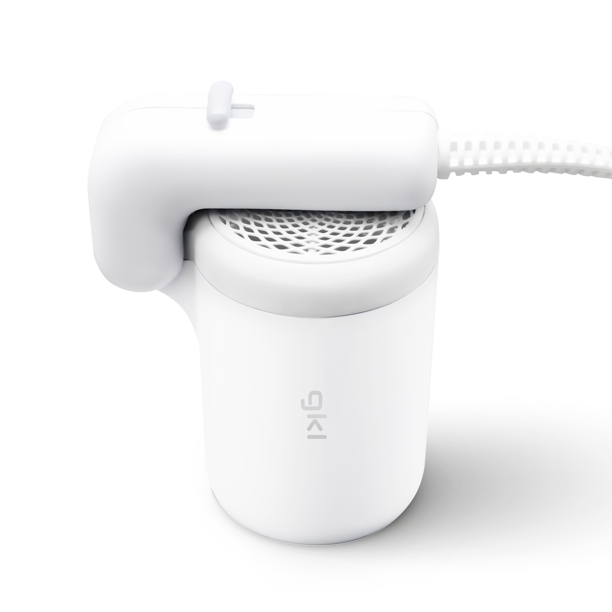 Dispositivo blanco, posiblemente un filtro, con cable de alimentación y asa superior.
