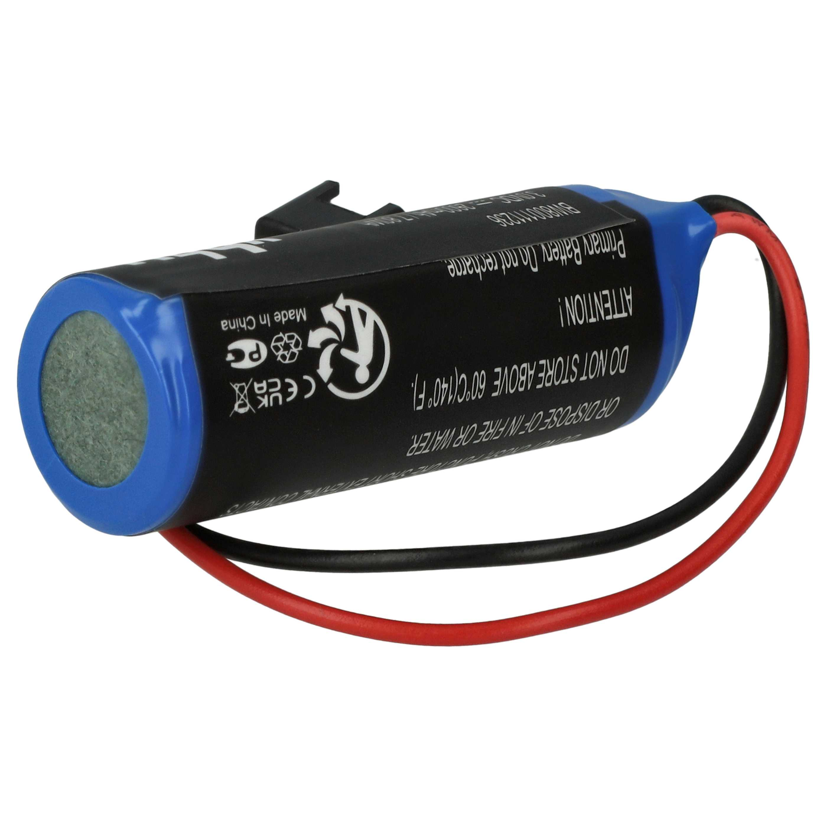 Eine kleine zylindrische schwarz-blaue Batterie mit roten und schwarzen Drähten, mit Sicherheitshinweisen.