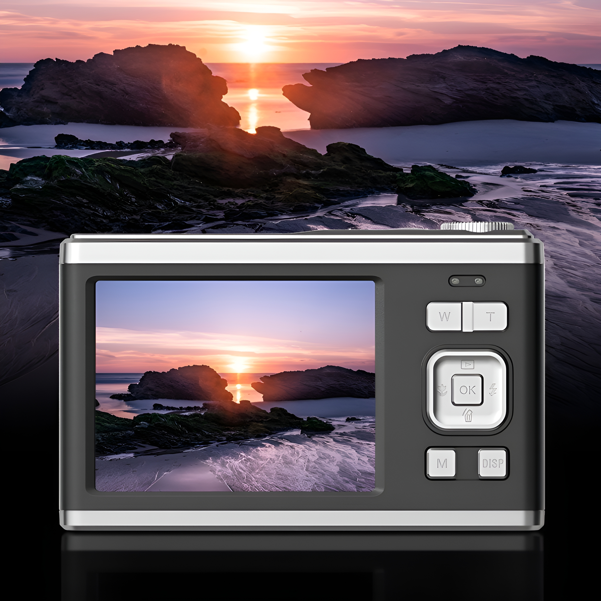 Eine Digitalkamera, die eine Sonnenuntergangsszene am Strand zeigt. Die Kamera hat Knöpfe und einen Silberrahmen.