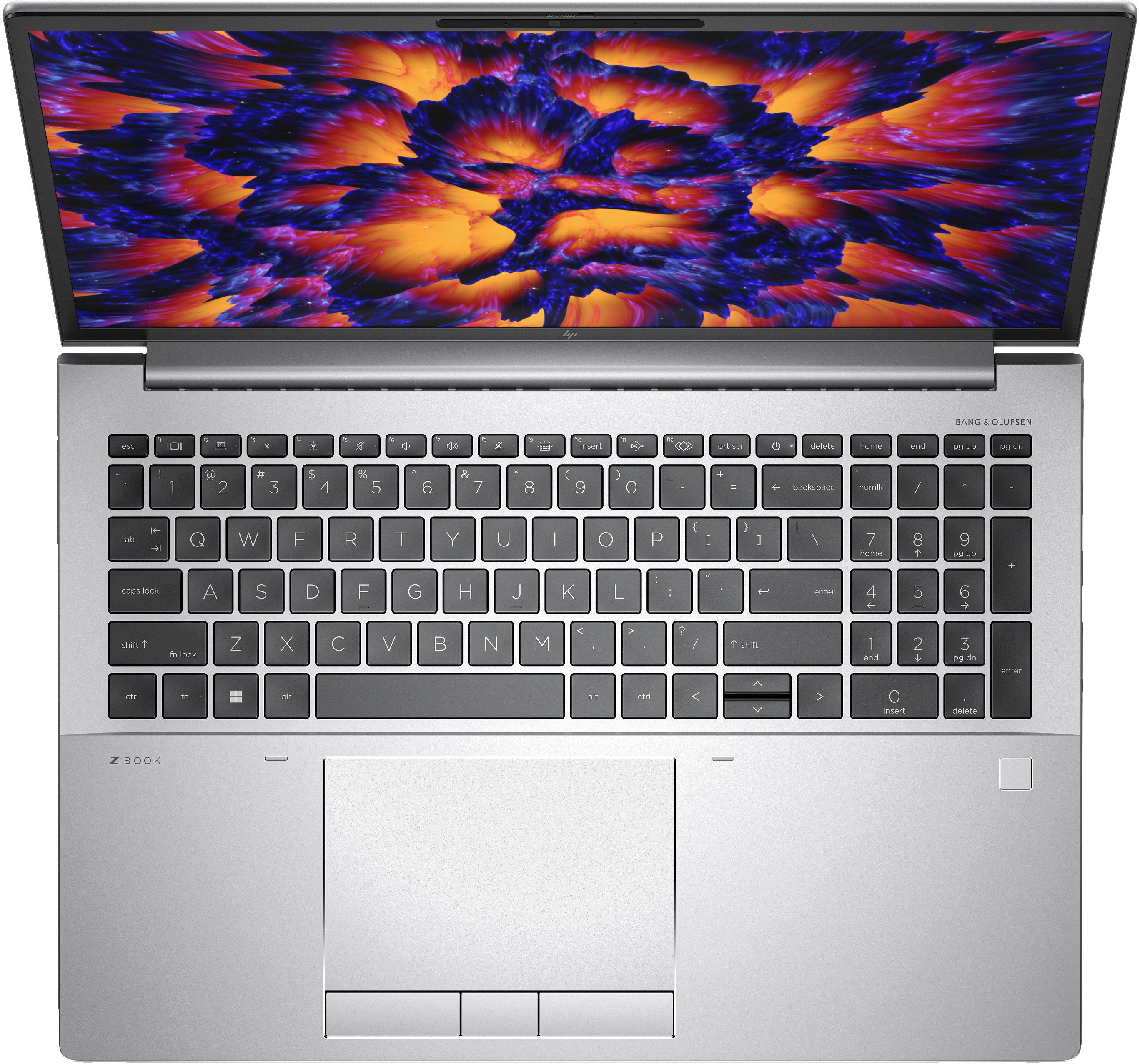 Laptop argento aperto, mostra un design astratto colorato sullo schermo.