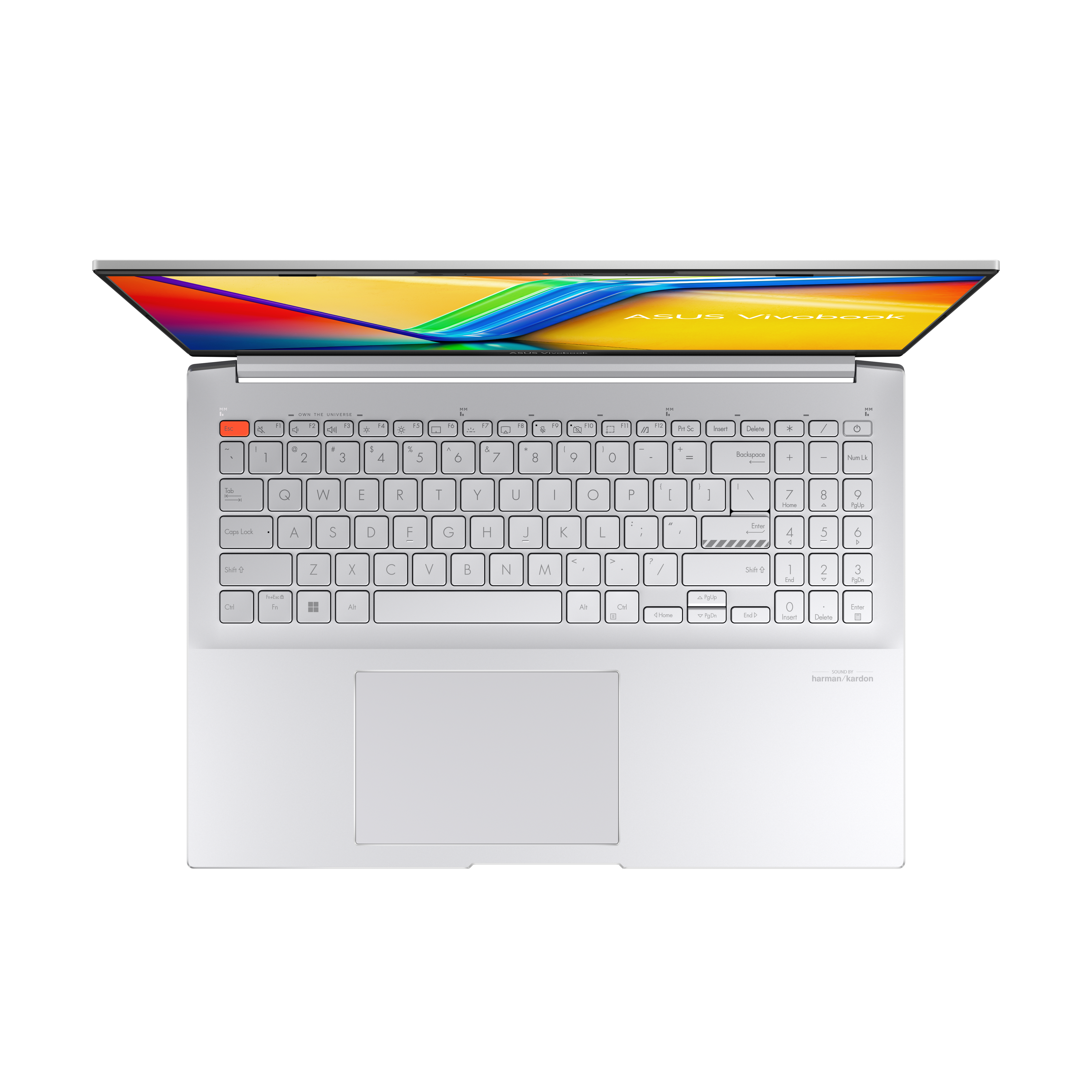 Laptop bianco, vista dall'alto, aperto, con tastiera e touchpad. Logo Harman/Kardon.