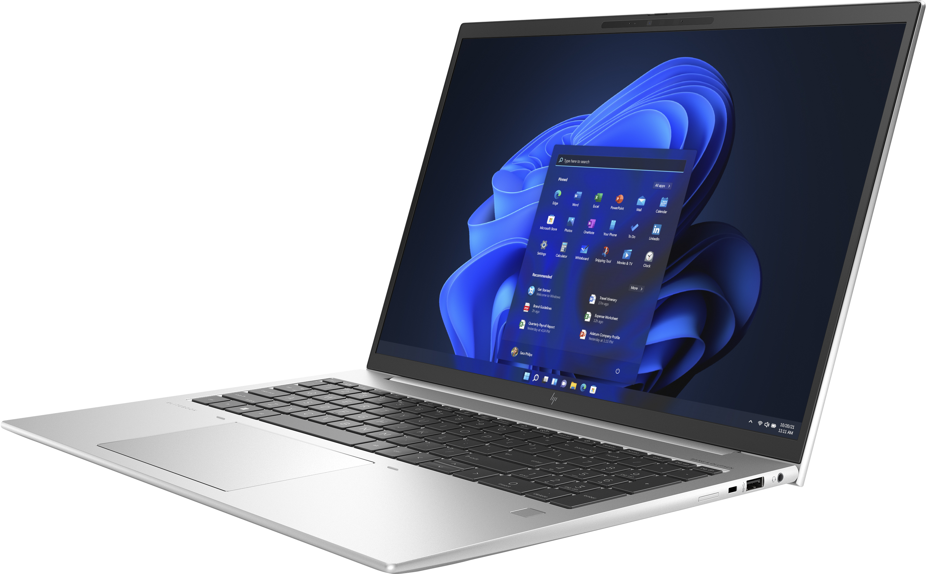 Laptop argento aperto, che mostra l'interfaccia di Windows 11, su sfondo scuro.