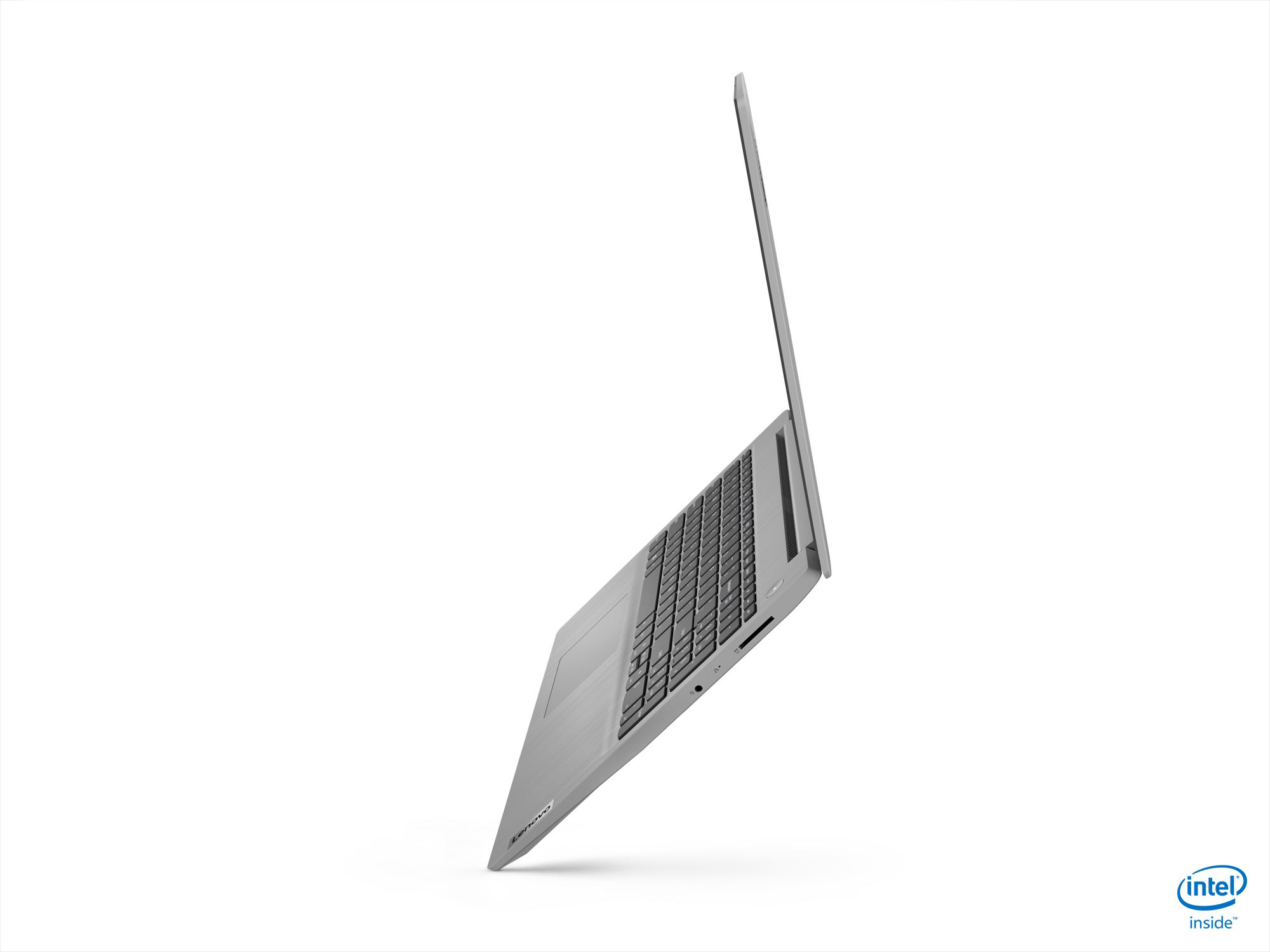 Laptop grigio, aperto. Vista laterale su sfondo bianco.