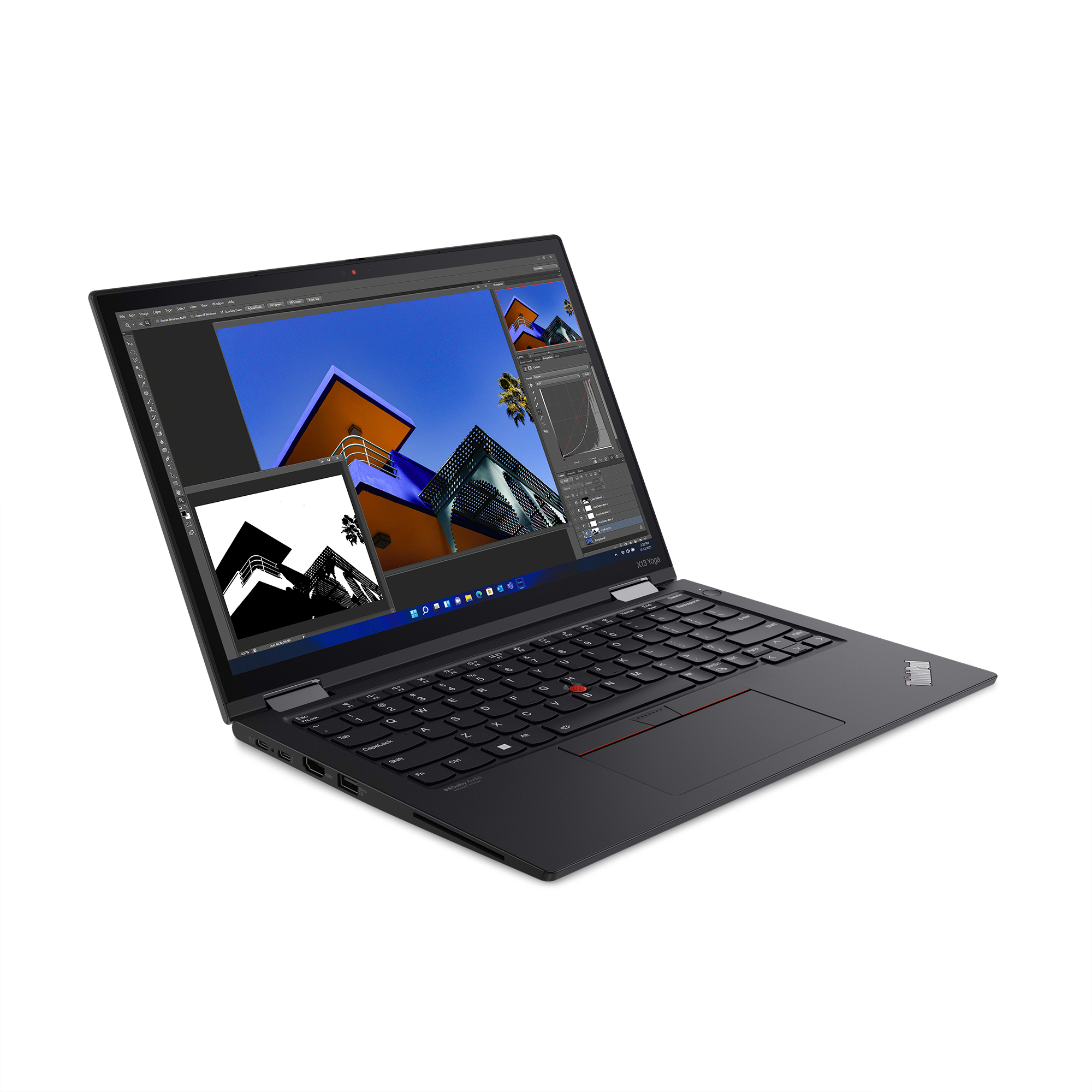 Black laptop, open, showing editing software interface. White background.