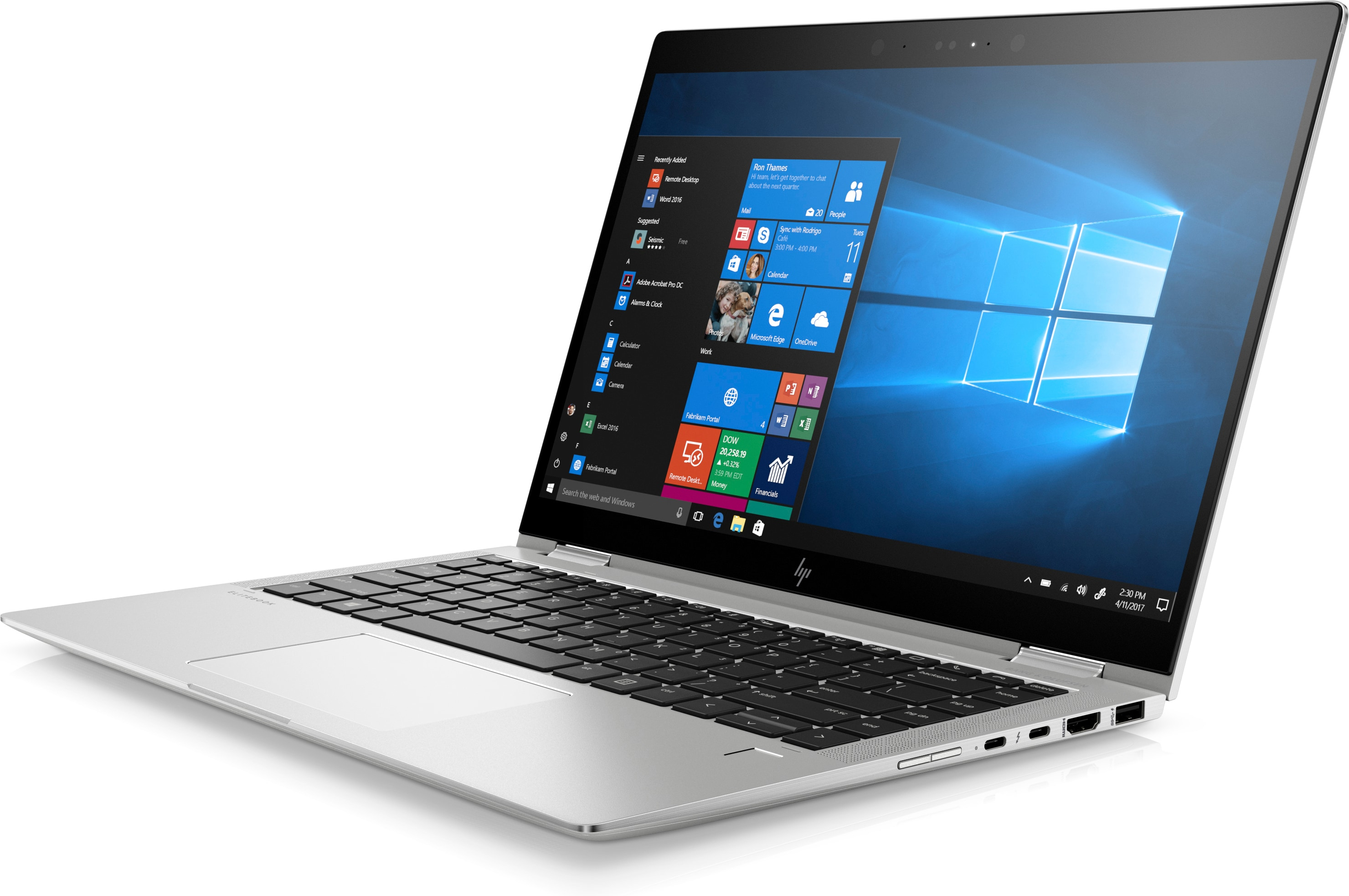 Laptop argento con schermo aperto. Menu di avvio di Windows visibile, laptop angolato.