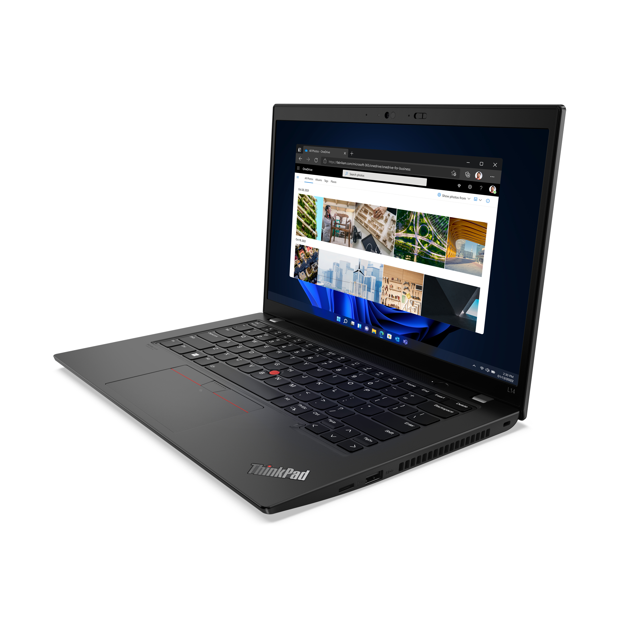 Black ThinkPad laptop displaying a webpage. The laptop is on a white surface.