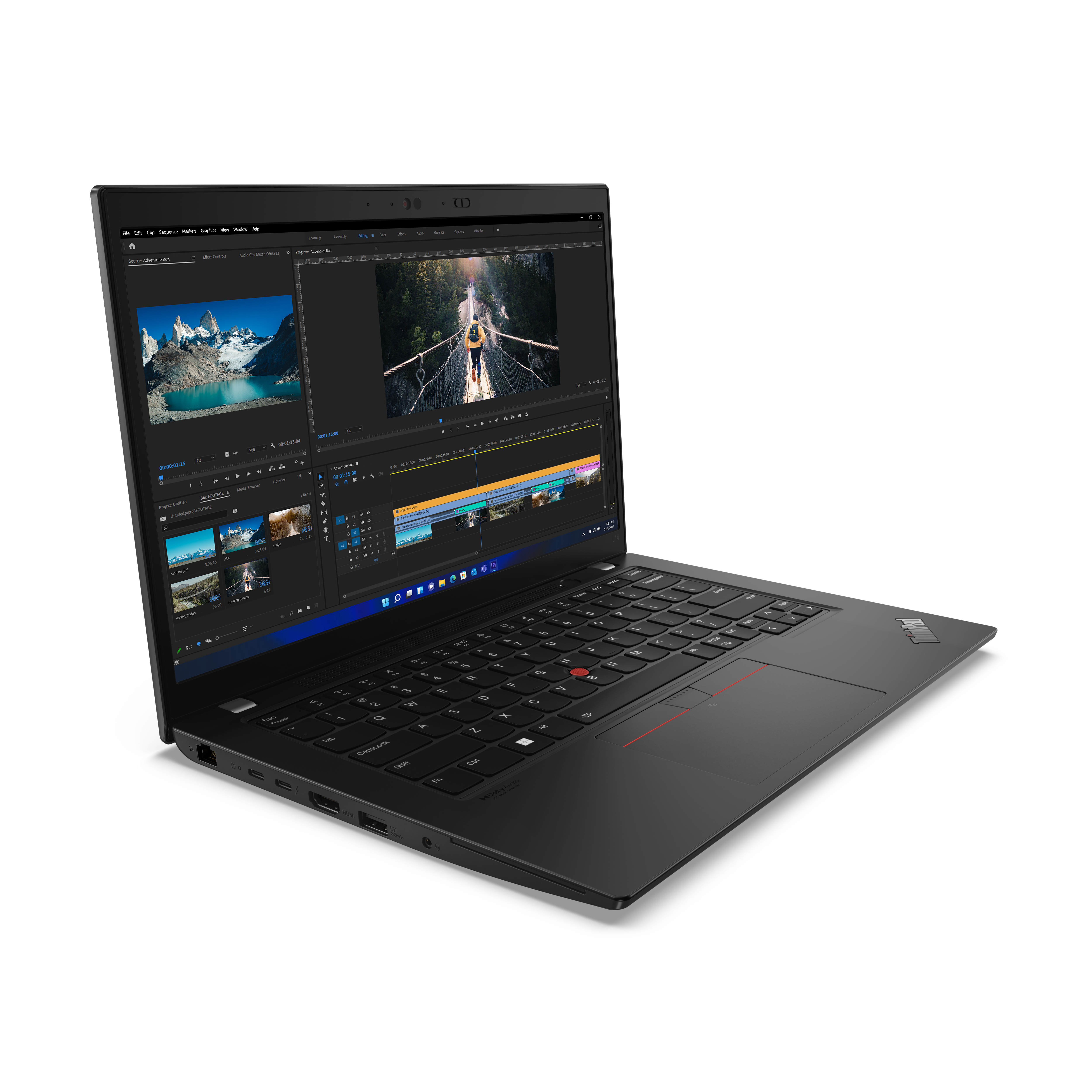 Black Lenovo laptop, open, displaying editing software. White background.
