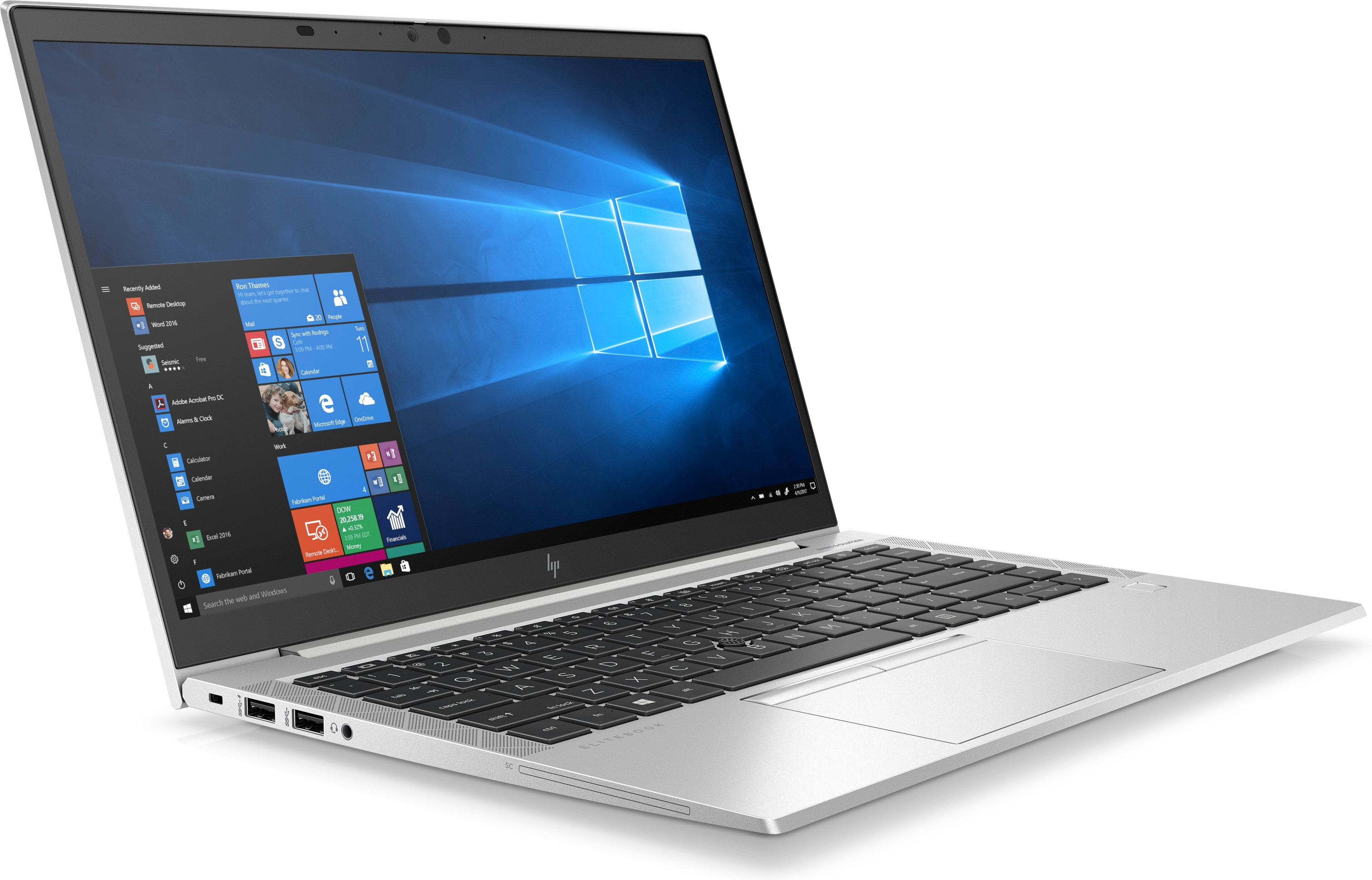 Laptop argentato, aperto, con interfaccia Windows. Tastiera visibile. Vista angolata.