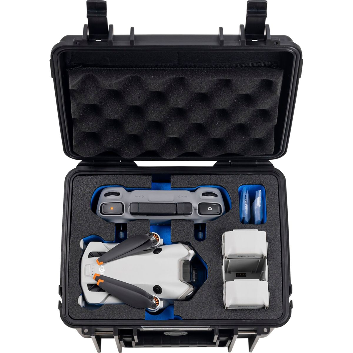 Drone e accessori in una custodia nera. Include drone, controller, batterie.