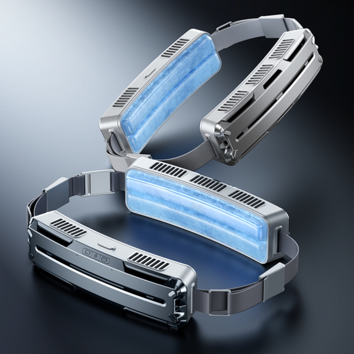 Zwei silber-blaue Nackenventilatoren auf dunkler Oberfläche.