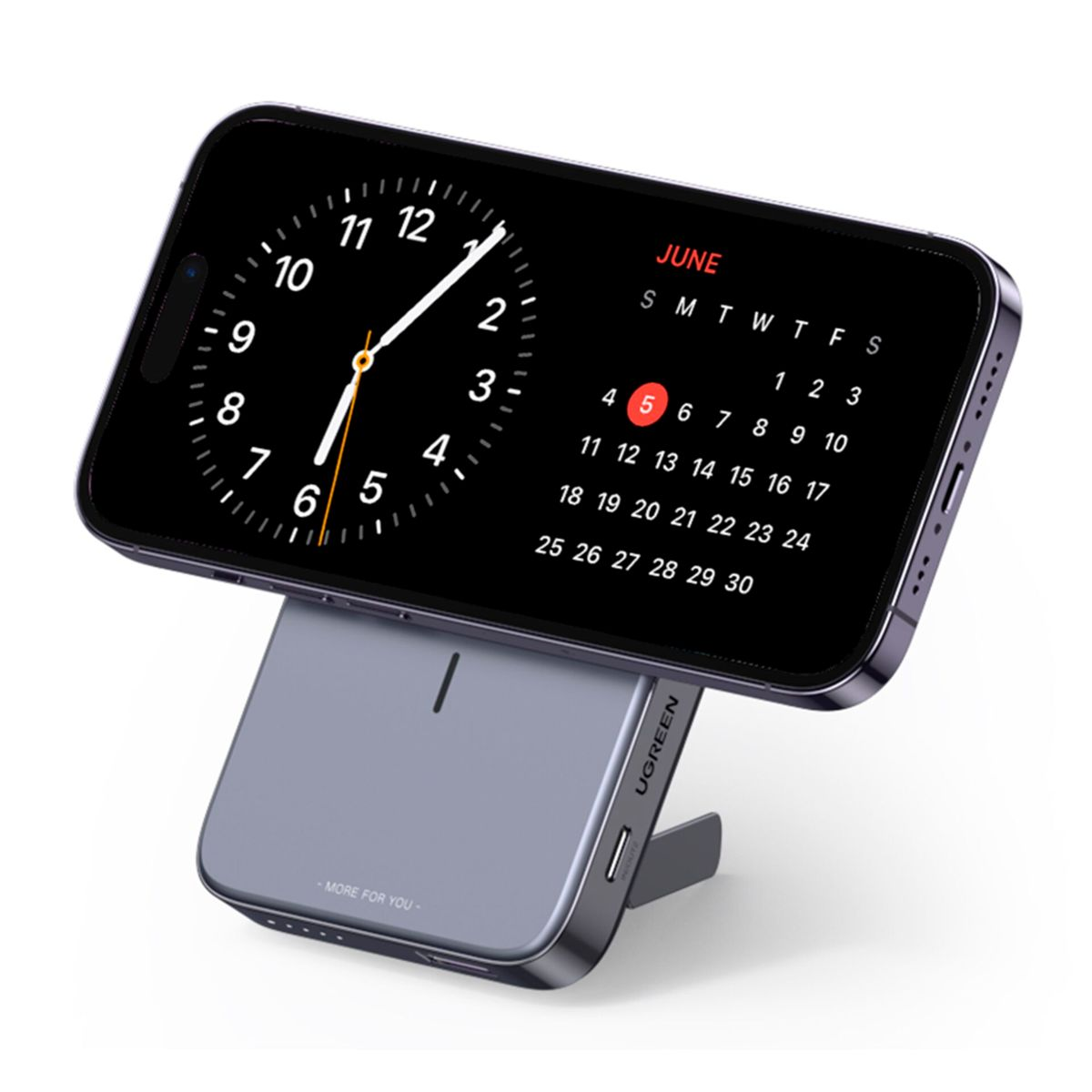 Telefon na podstawce ładującej, wyświetlający zegar i kalendarz.
