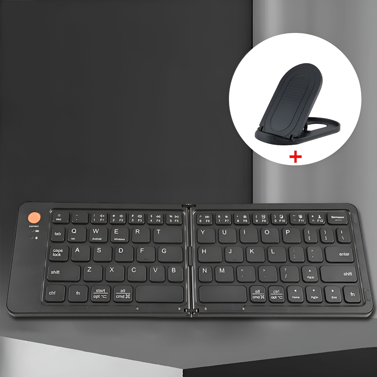 Schwarze, faltbare Tastatur offen, mit Telefonständer auf schwarzer Fläche.