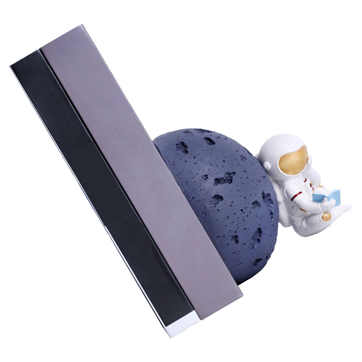 Ein Buchstütze mit Mond und kleinem Astronauten. Die Buchstütze ist grau und schwarz.