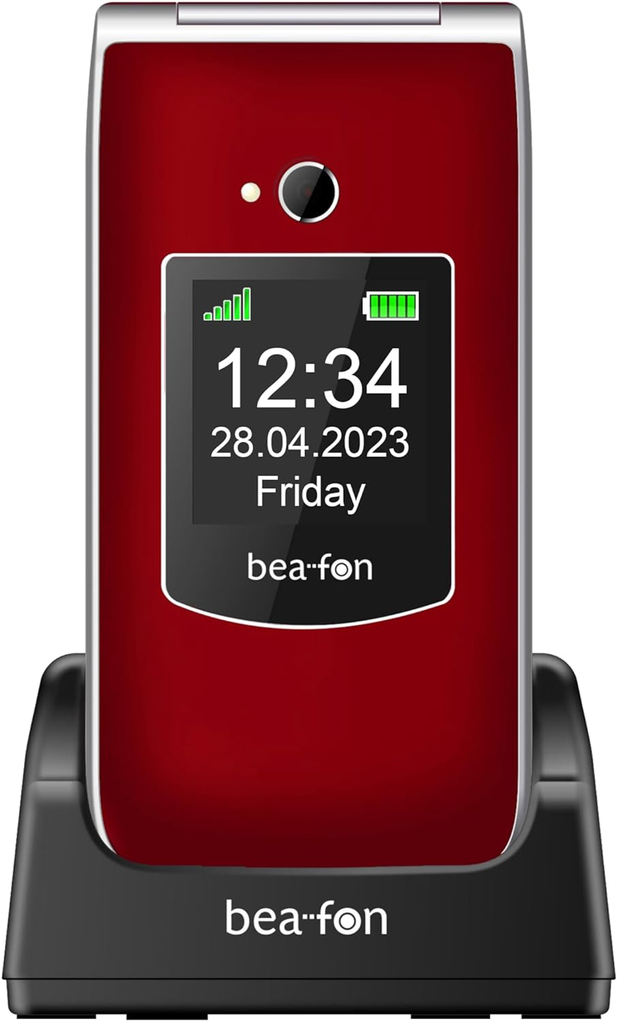 Teléfono rojo plegable en una base de carga negra, la pantalla muestra la hora y la fecha.