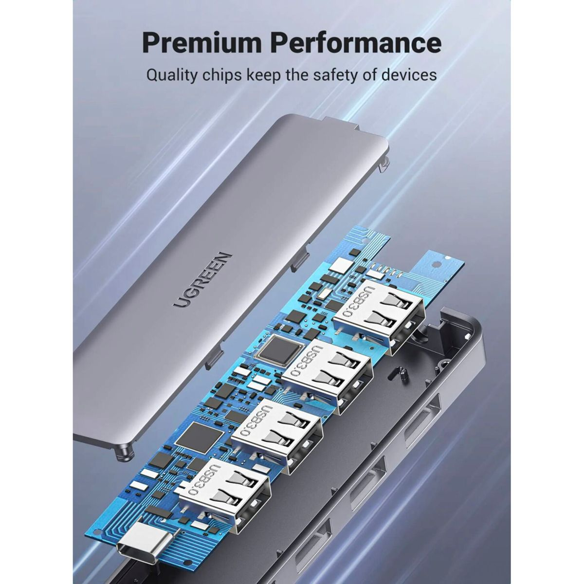 Hub USB z etykietą UGREEN. Posiada porty USB i elementy elektroniczne.