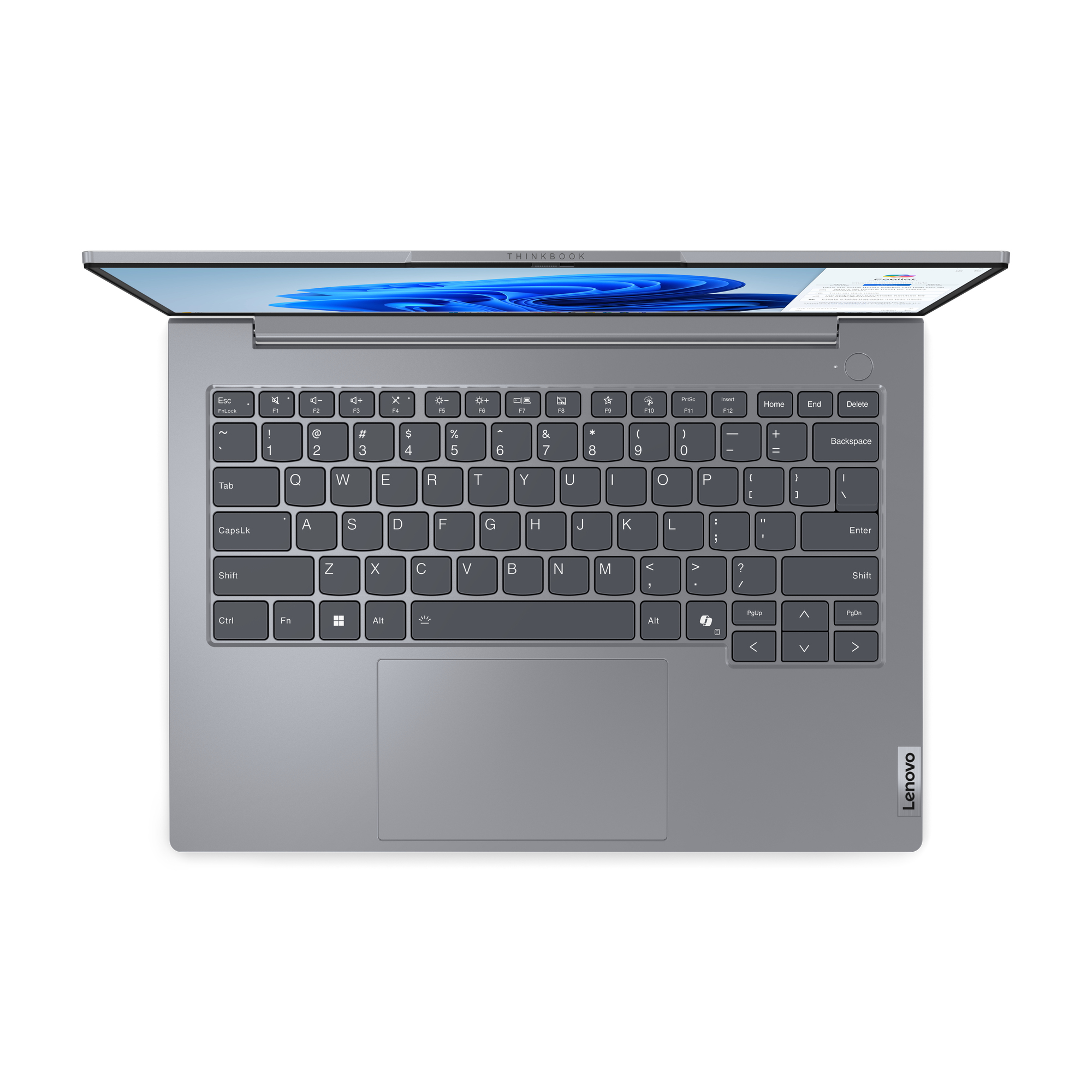 Tastiera del laptop, vista dall'alto. Mostra tasti, touchpad e marchio Lenovo su una superficie bianca.