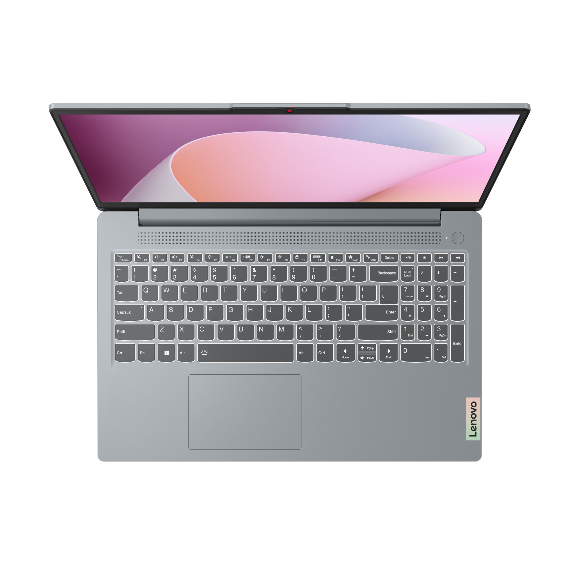 Un laptop, vista dall'alto, aperto, con corpo argentato, tastiera nera e schermo rosa e bianco.