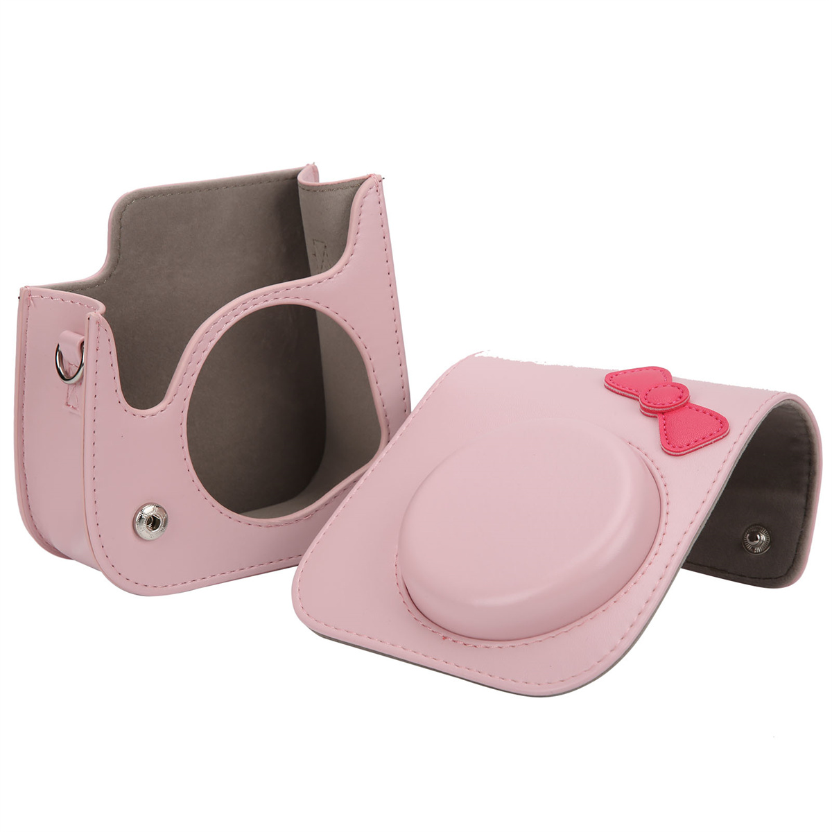 Eine rosa Kameratasche mit Schleifendetail, geöffnet.