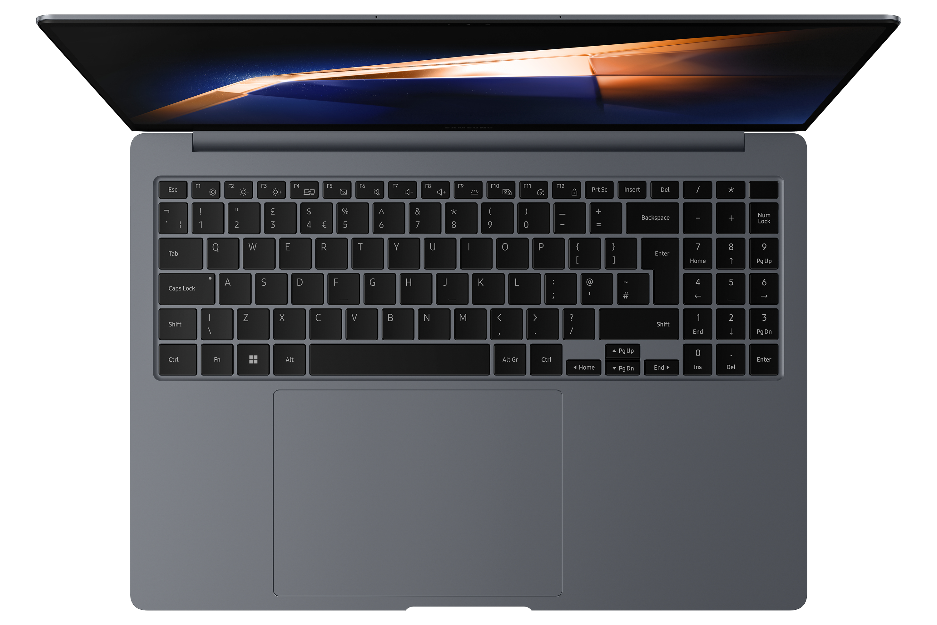Laptop von oben. Tastatur sichtbar. Der Bildschirm zeigt einen dunklen Hintergrund mit goldenen Akzenten.