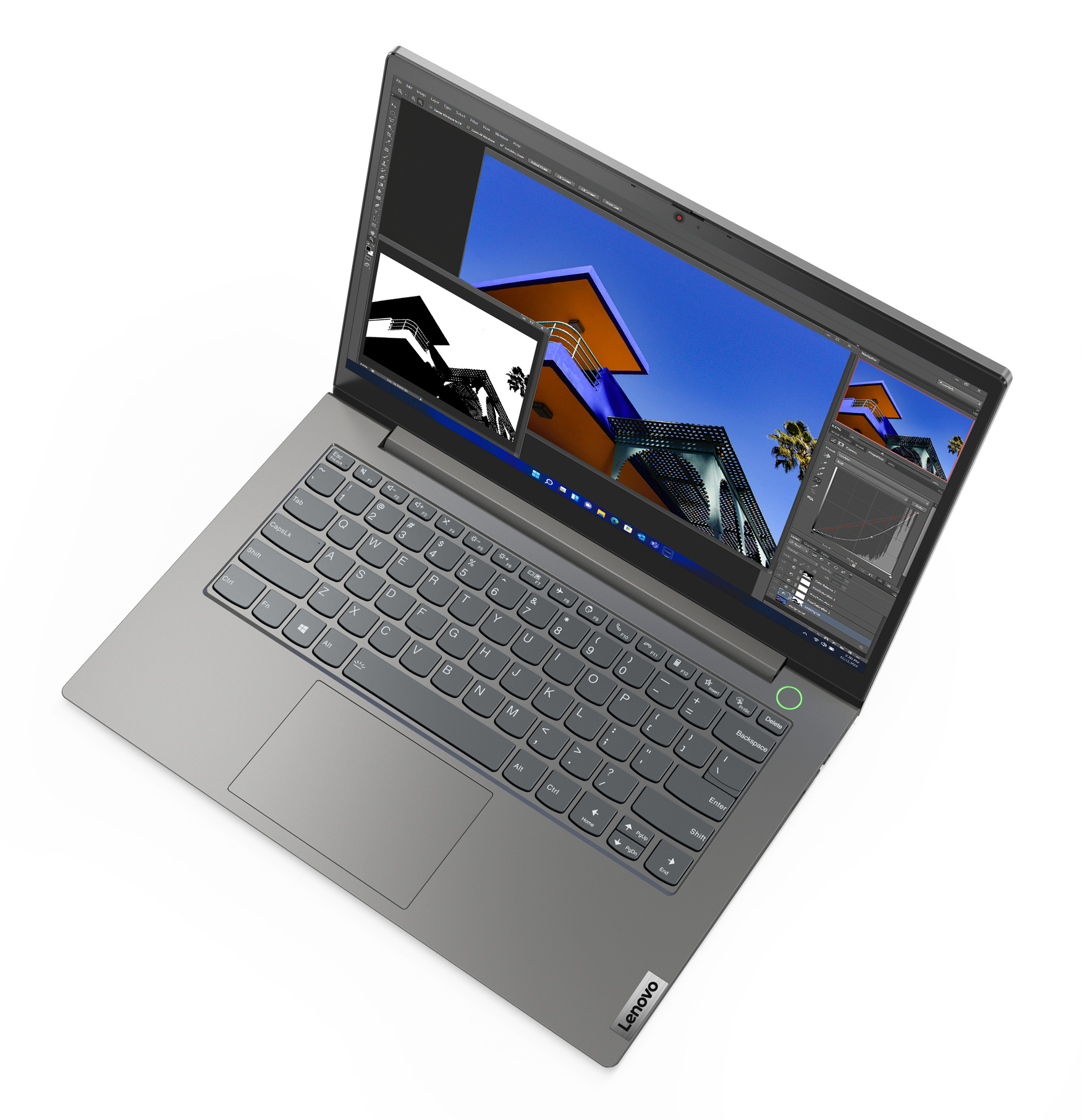 Laptop zeigt Architektur-Rendering. Tastatur und Trackpad sichtbar. Weißer Hintergrund.