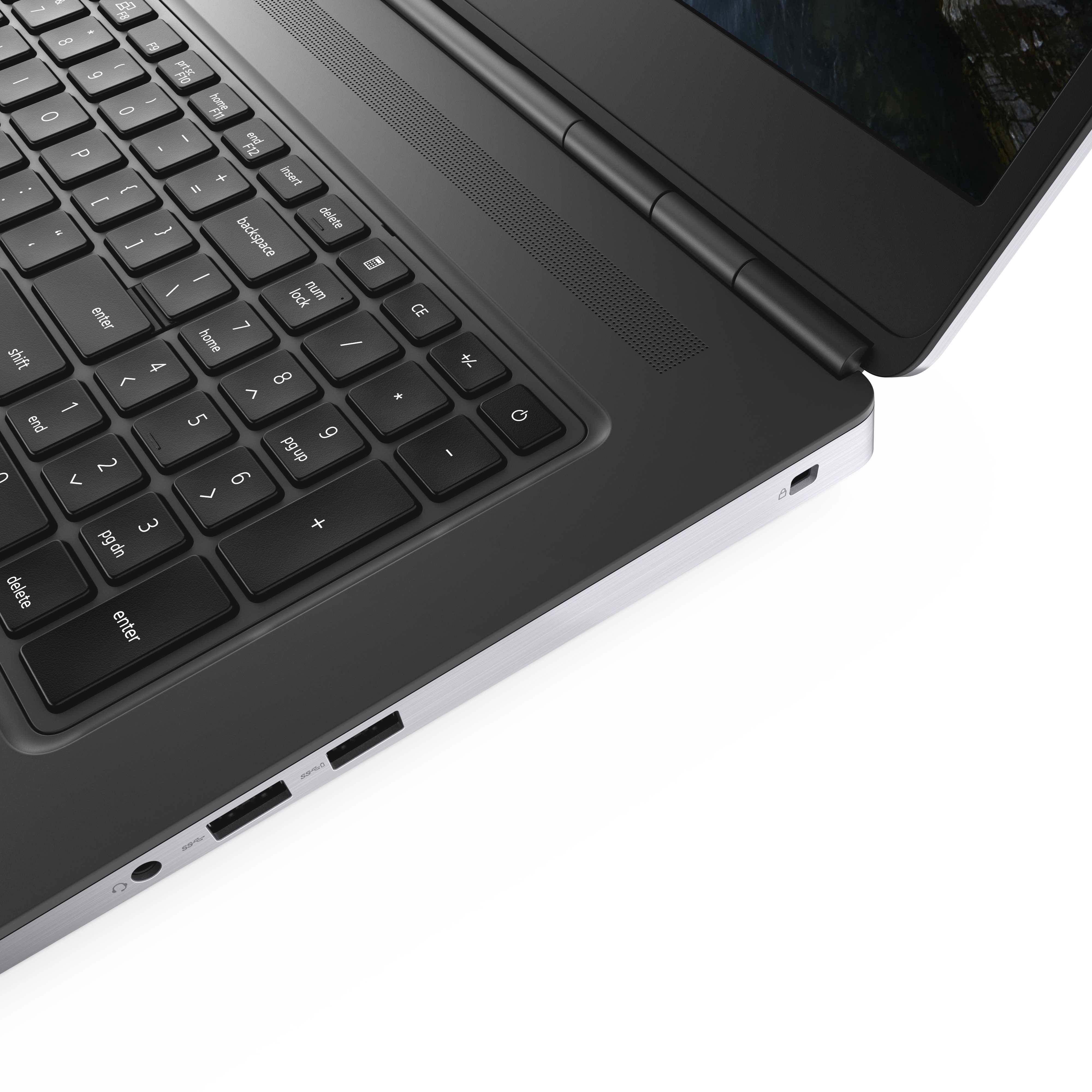 Laptop-Tastatur und Anschlüsse. Tastatur ist schwarz, mit Anschlüssen an der Seite.