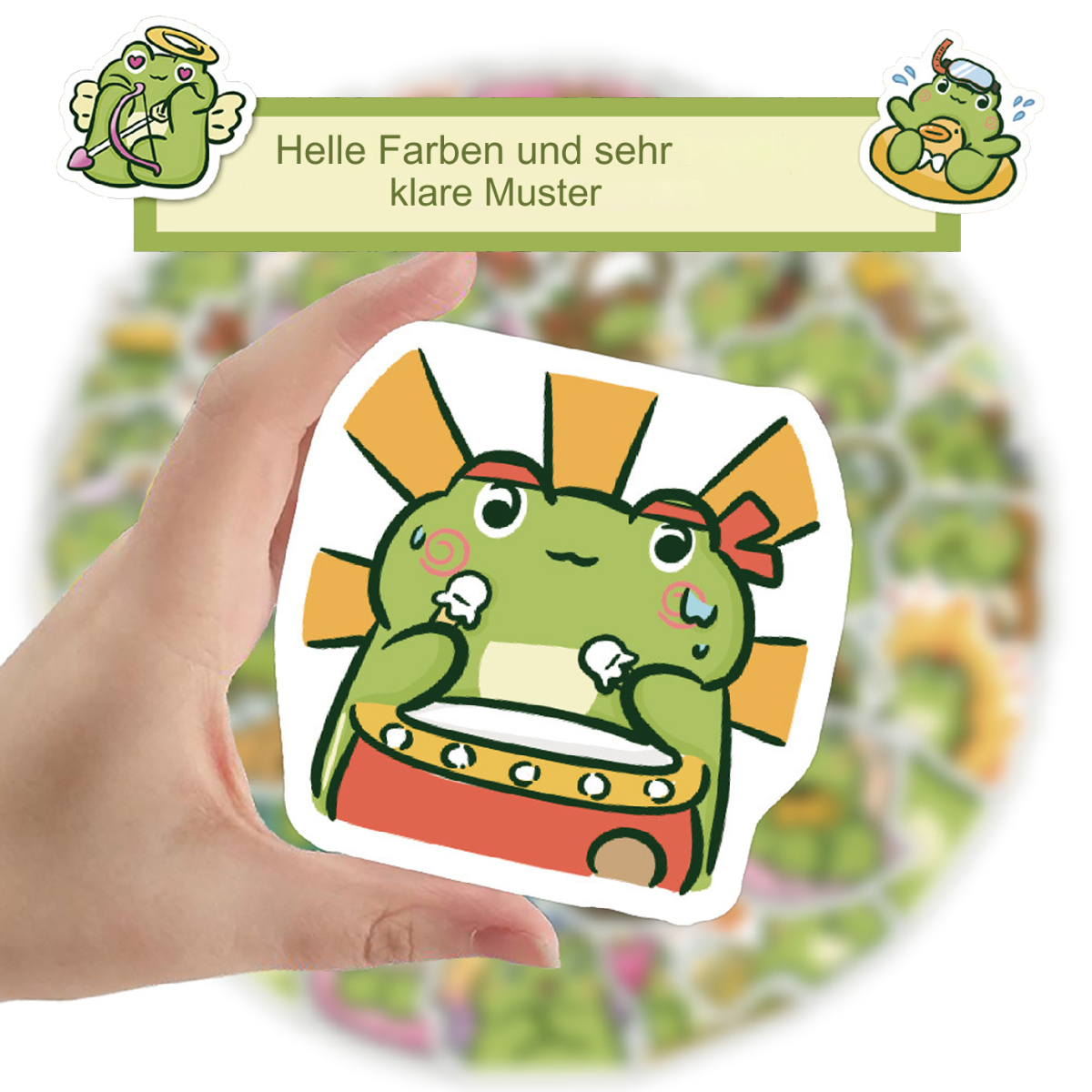 Hand hält Frosch-Aufkleber mit hellgrünem Körper, roter Fliege und gelbem Hintergrund.