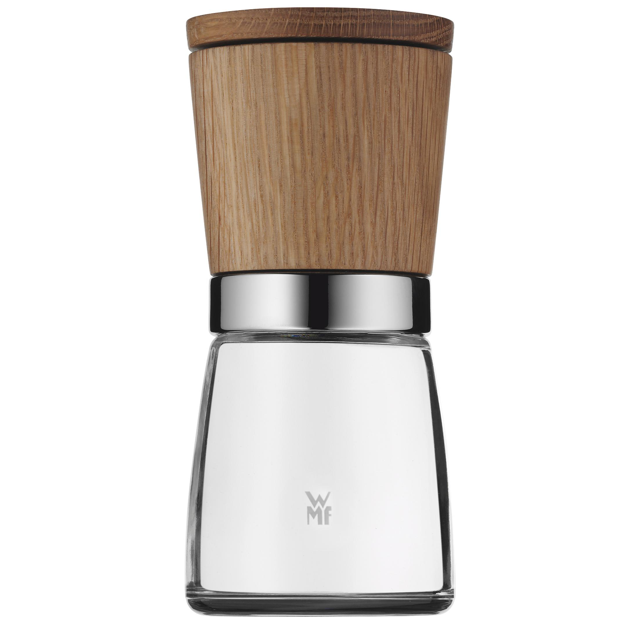 Eine Salz- und Pfeffermühle mit Holzaufsatz und Glasfuß.