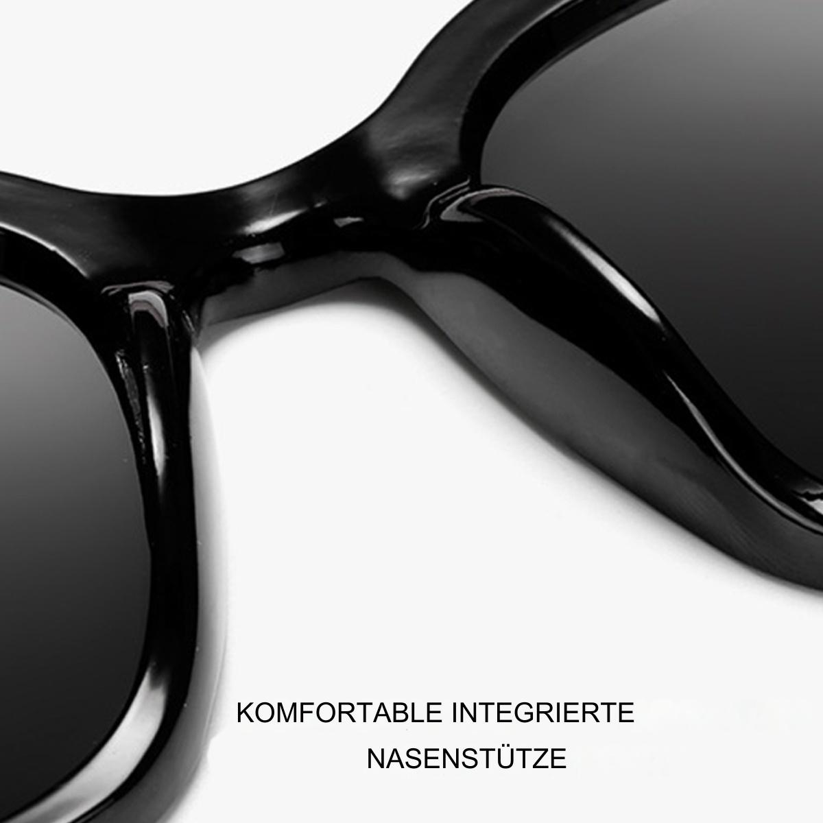 Nahaufnahme einer schwarzen Sonnenbrille mit Text über Nasenpads.